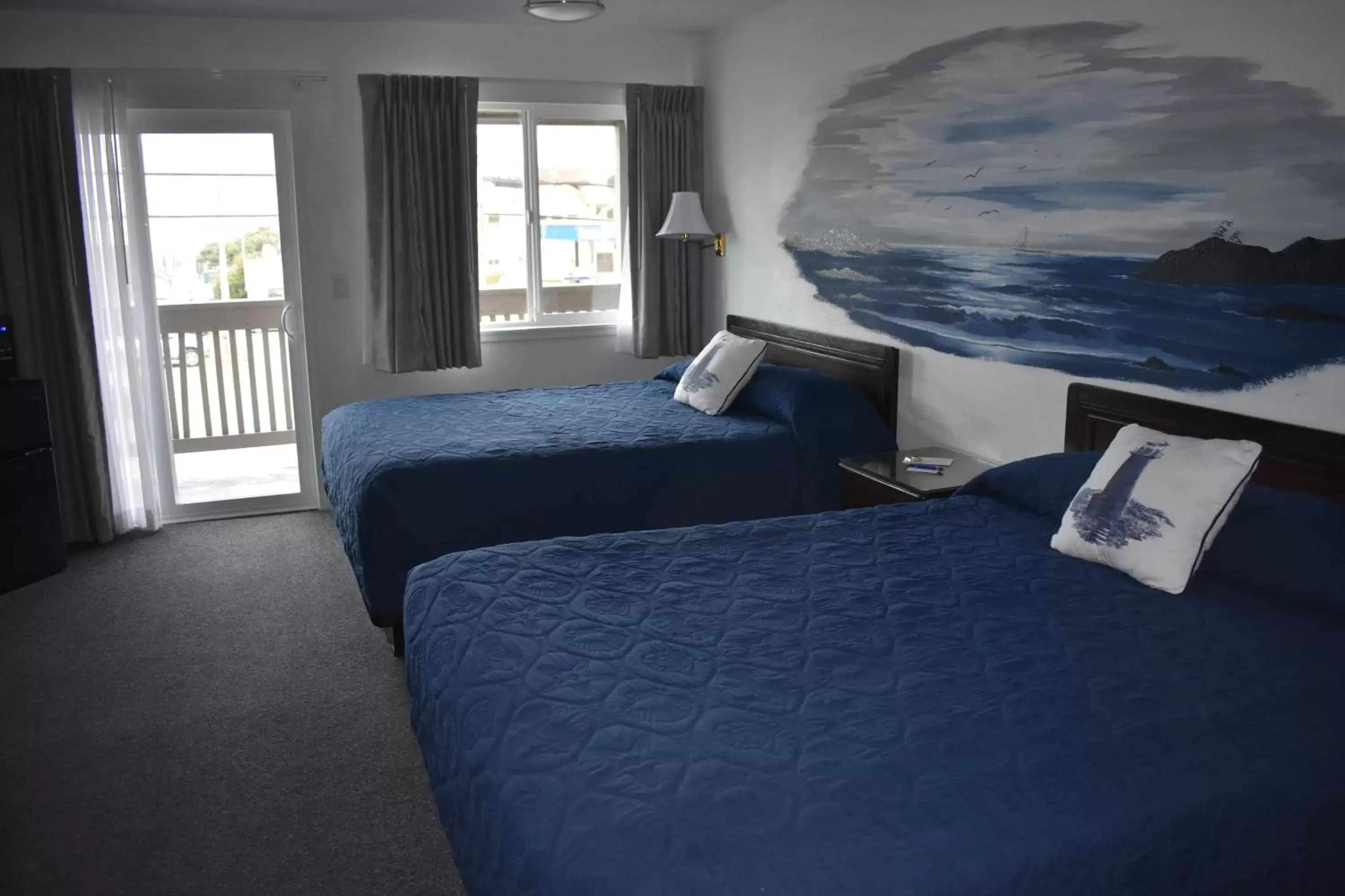 Bed in Lighthouse Cove Inn