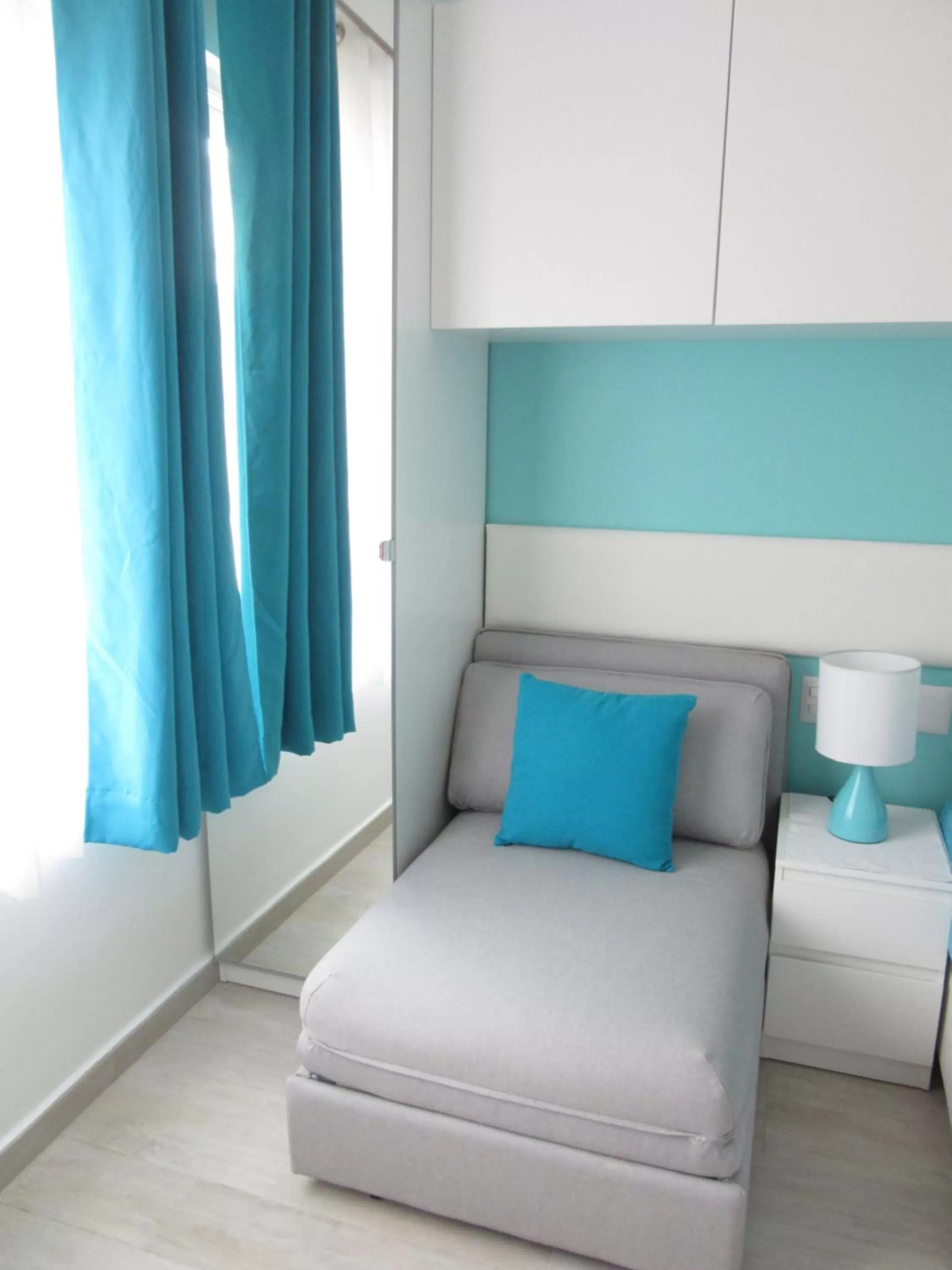 Bed in Coral Village - "Caribbean Cocktails" Deluxe Suites & Pool