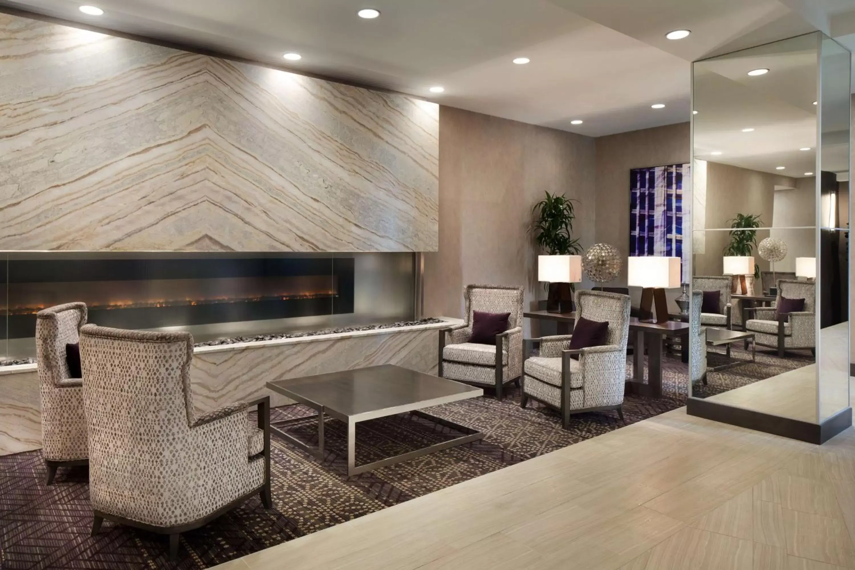 Lobby or reception in Embassy Suites by Hilton Charlotte Uptown