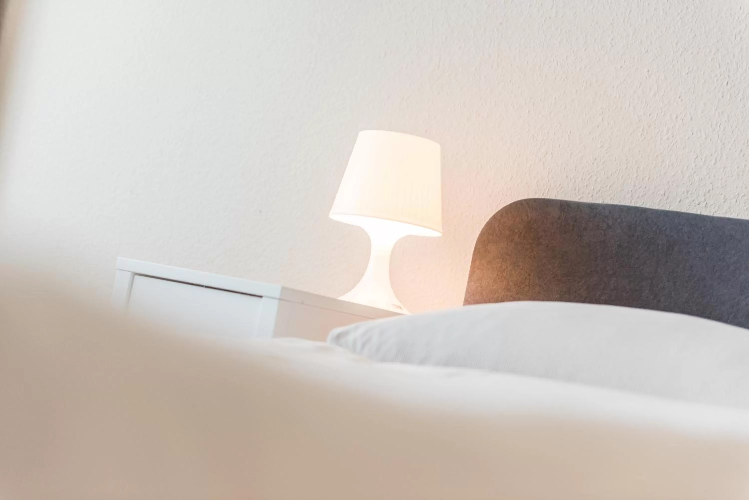 Decorative detail, Bed in Schäfers Hotel, Self-Check-in, Cafe und Bäcker am Hotel