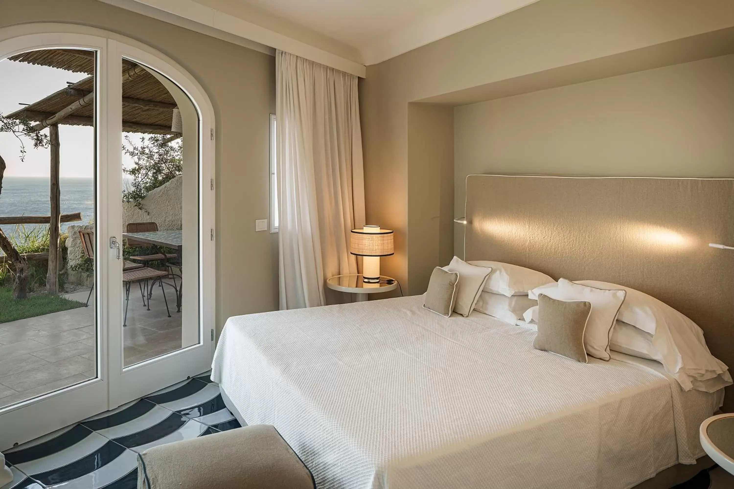 Bed in Costa Del Capitano Seaview Suites & Villas