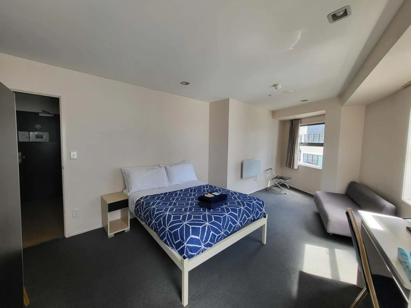 Bed in Empire Apartments