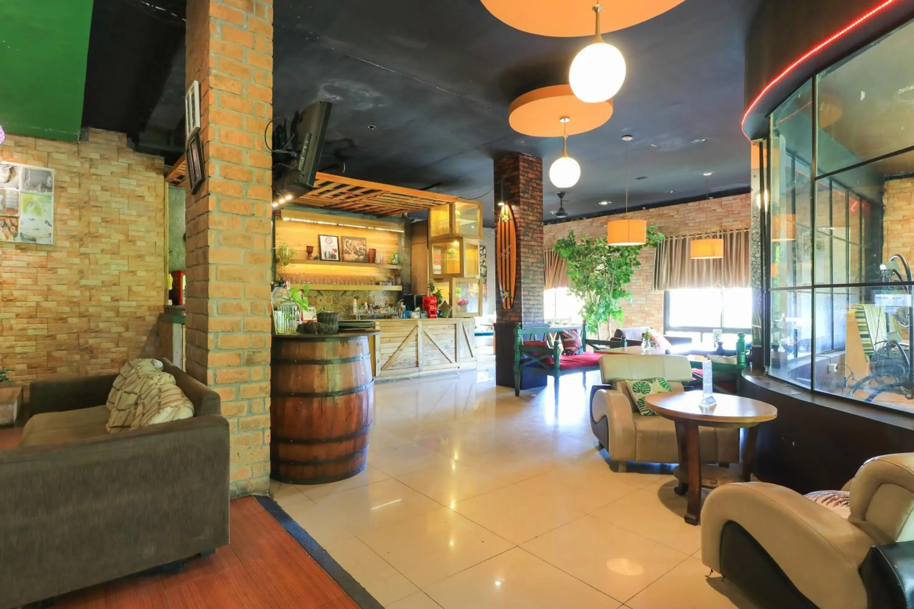 Lounge/Bar in Labuana Homestay & Cafe Garden by ZUZU