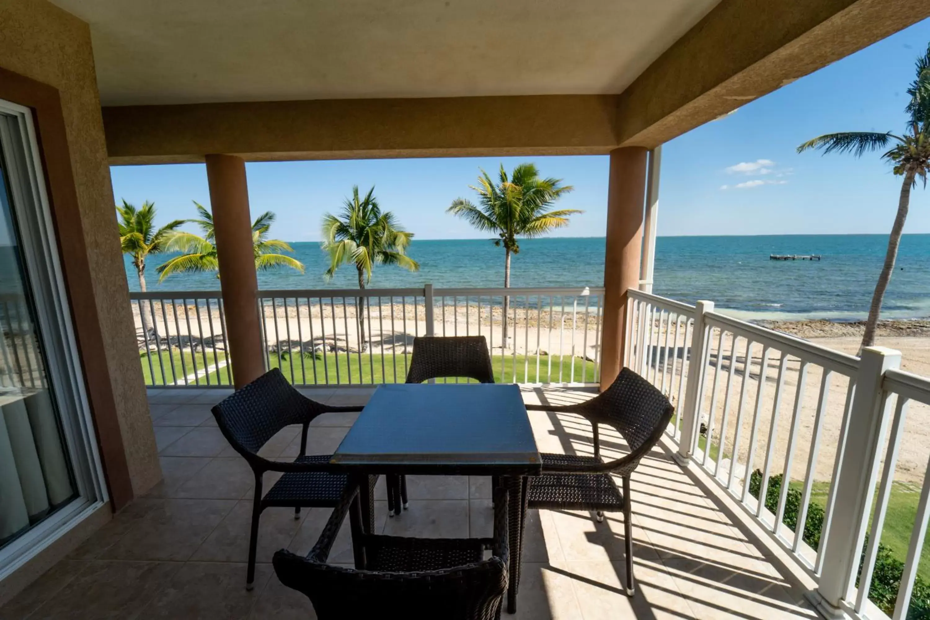 Patio, Sea View in Holiday Inn Resort Grand Cayman, an IHG Hotel