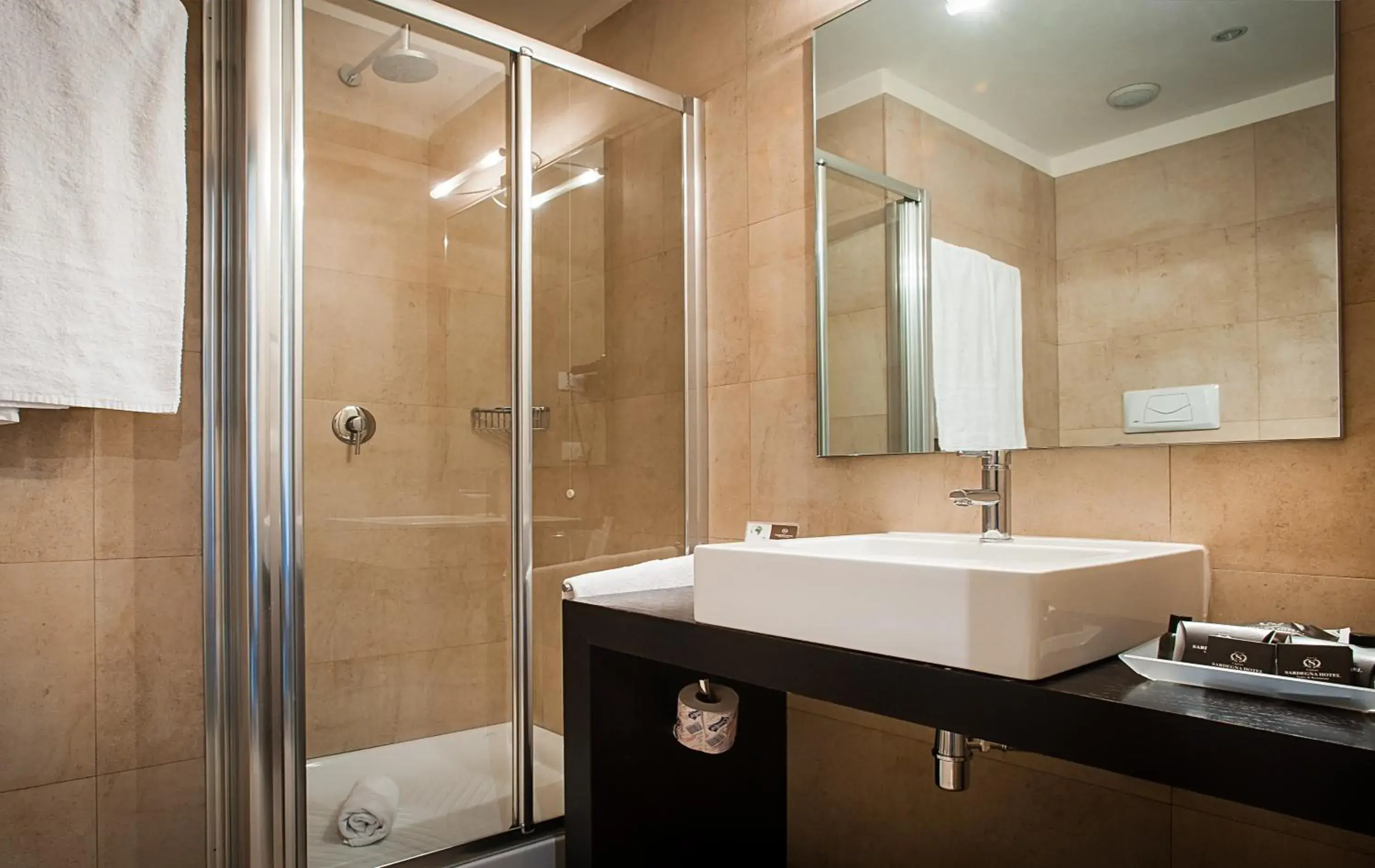 Bathroom in Sardegna Hotel - Suites & Restaurant
