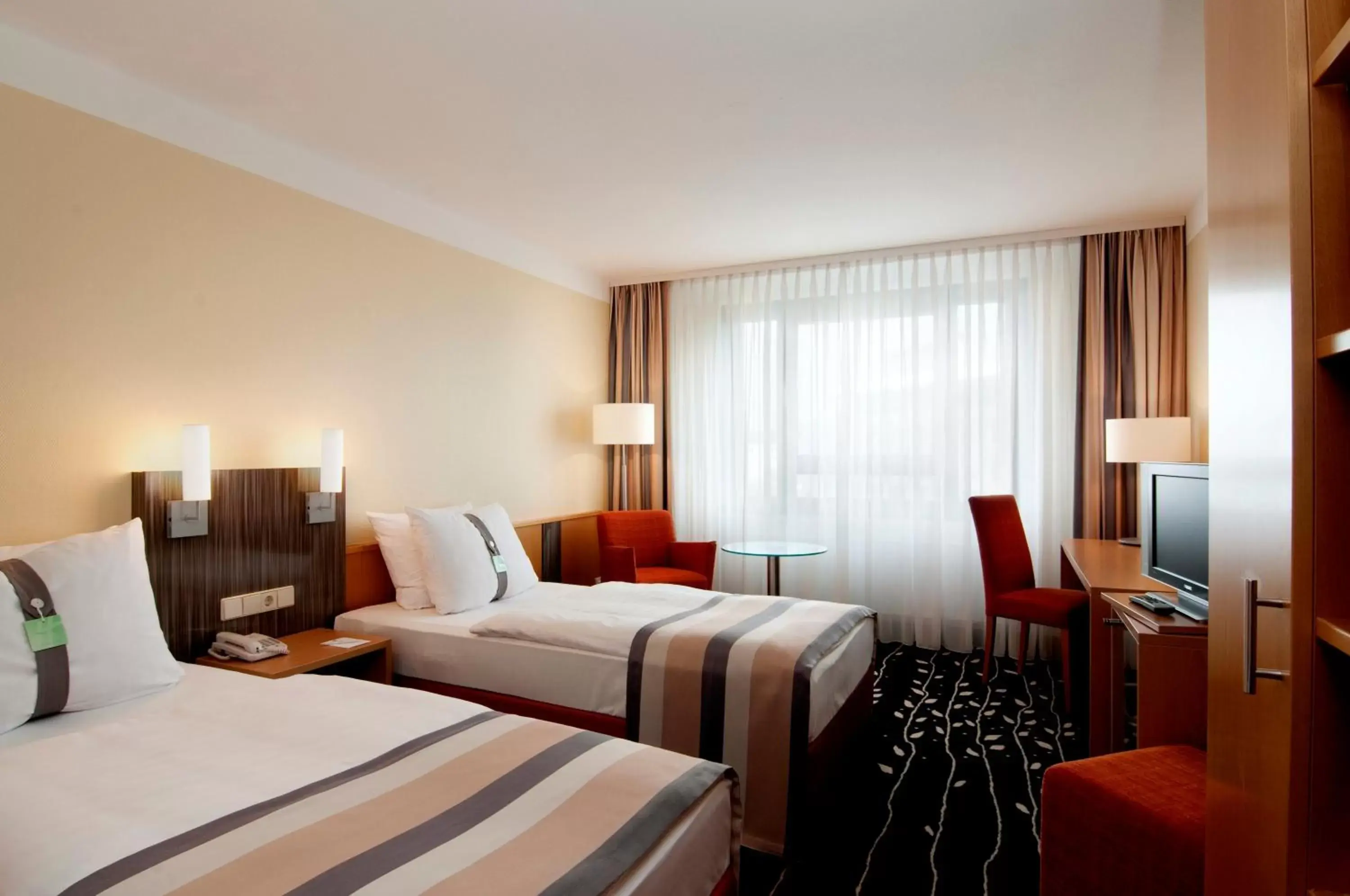 Photo of the whole room, Bed in Holiday Inn Stuttgart, an IHG Hotel