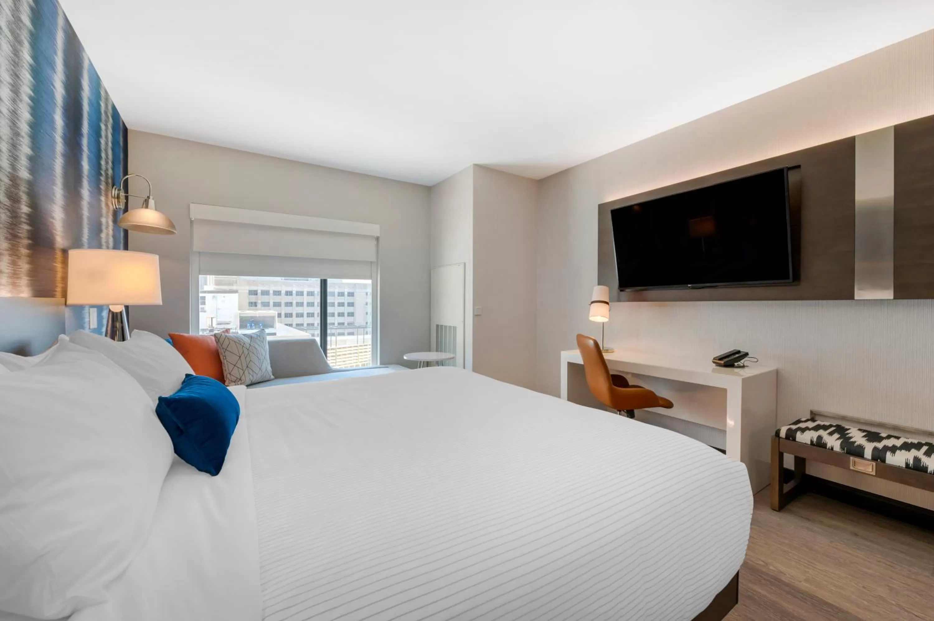 Bed in Cambria Hotel Detroit Downtown