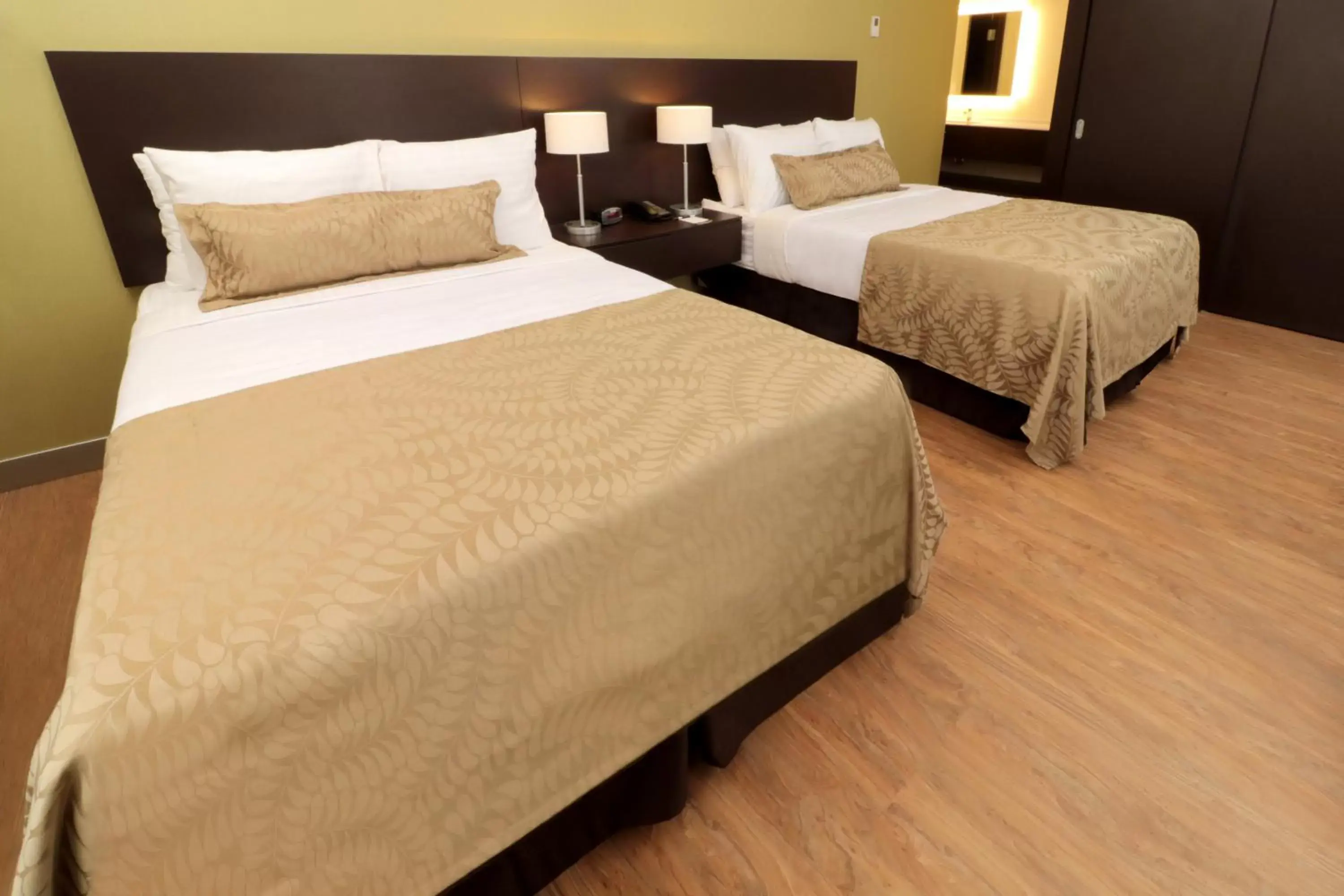 Bed in Staybridge Suites San Luis Potosi, an IHG Hotel