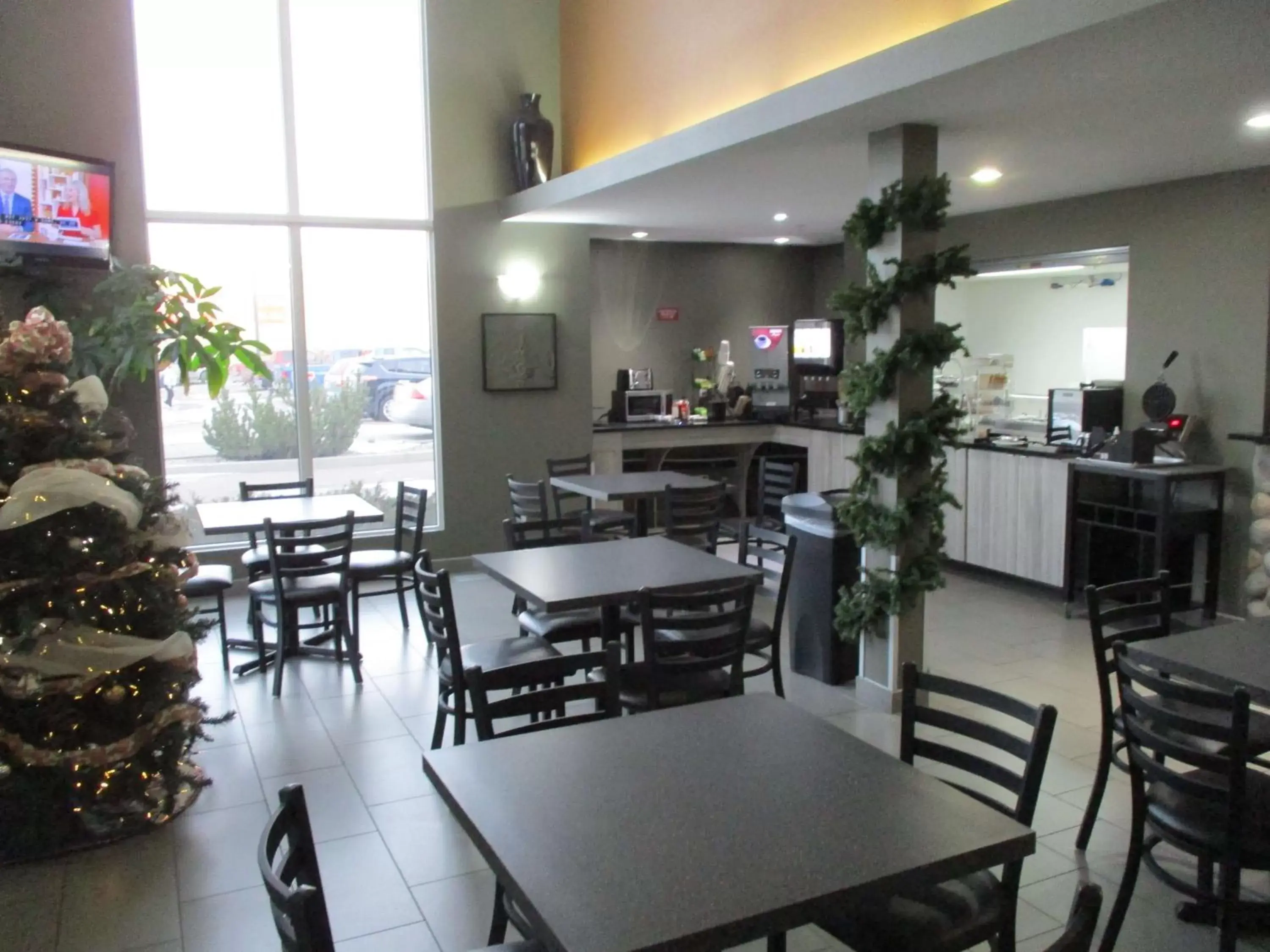 Lobby or reception, Restaurant/Places to Eat in SureStay Plus Hotel by Best Western Lethbridge