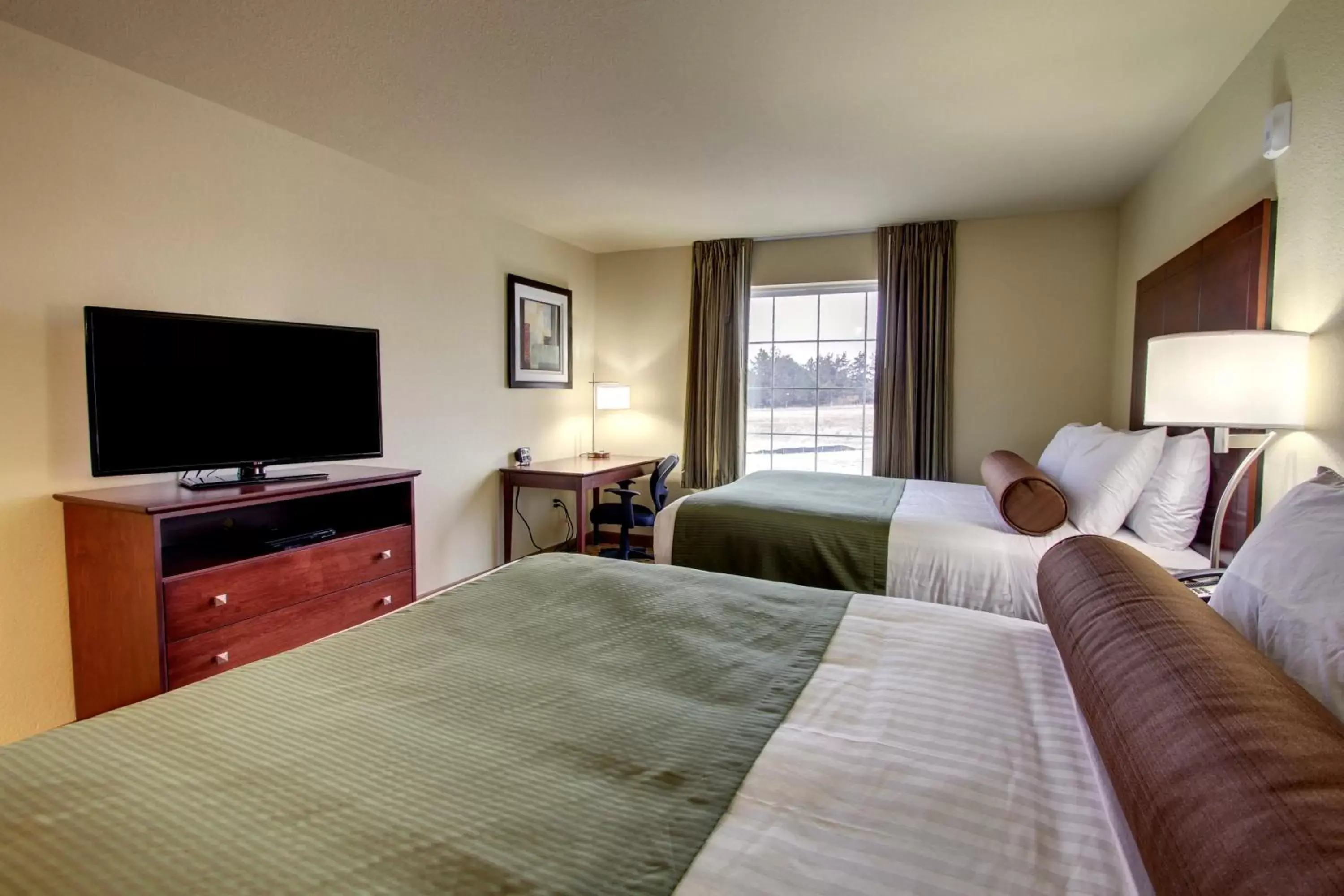 Bedroom, TV/Entertainment Center in Stanton Inn and Suites