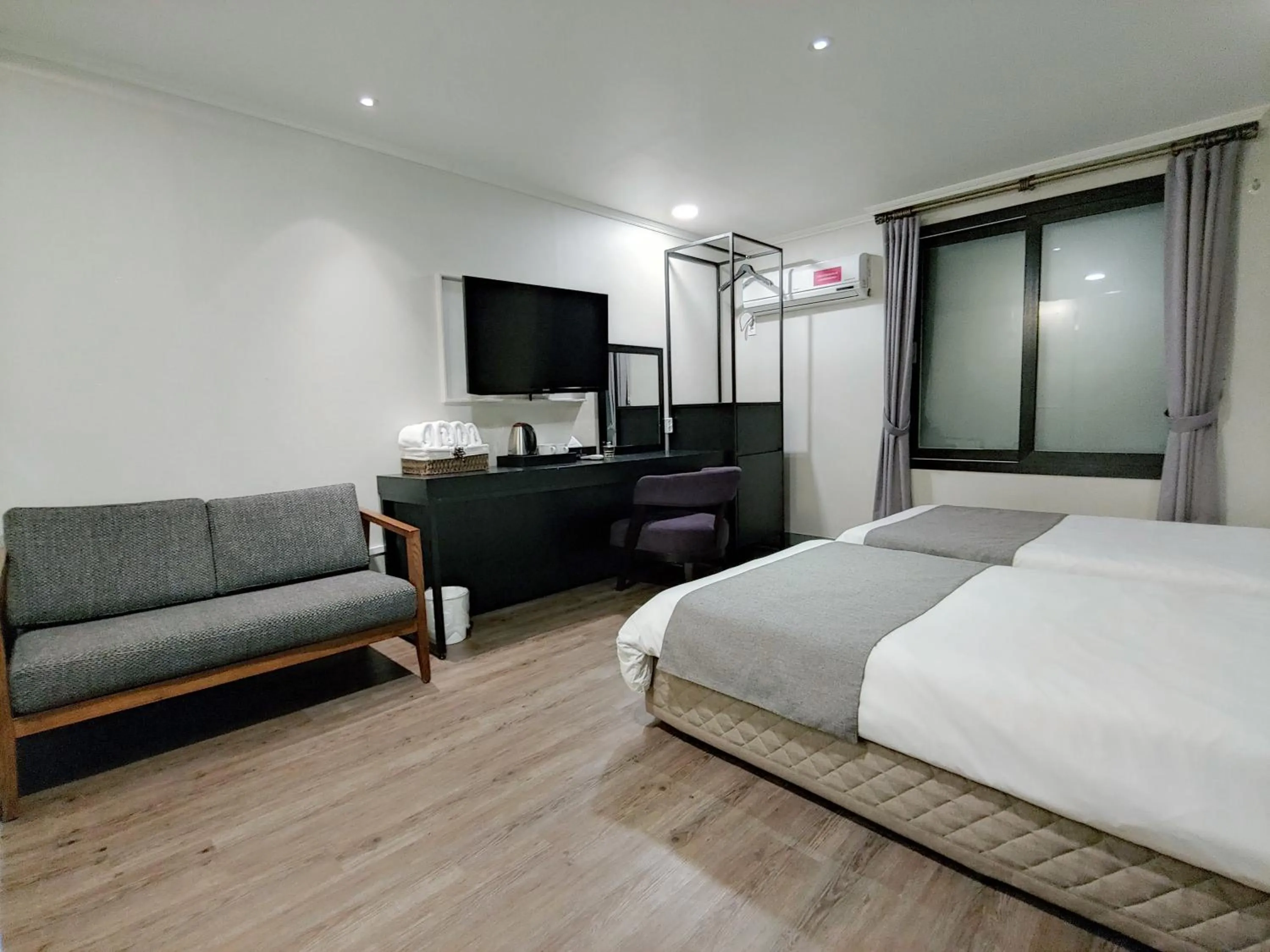 Bed in Hotel Tong Yeondong Jeju