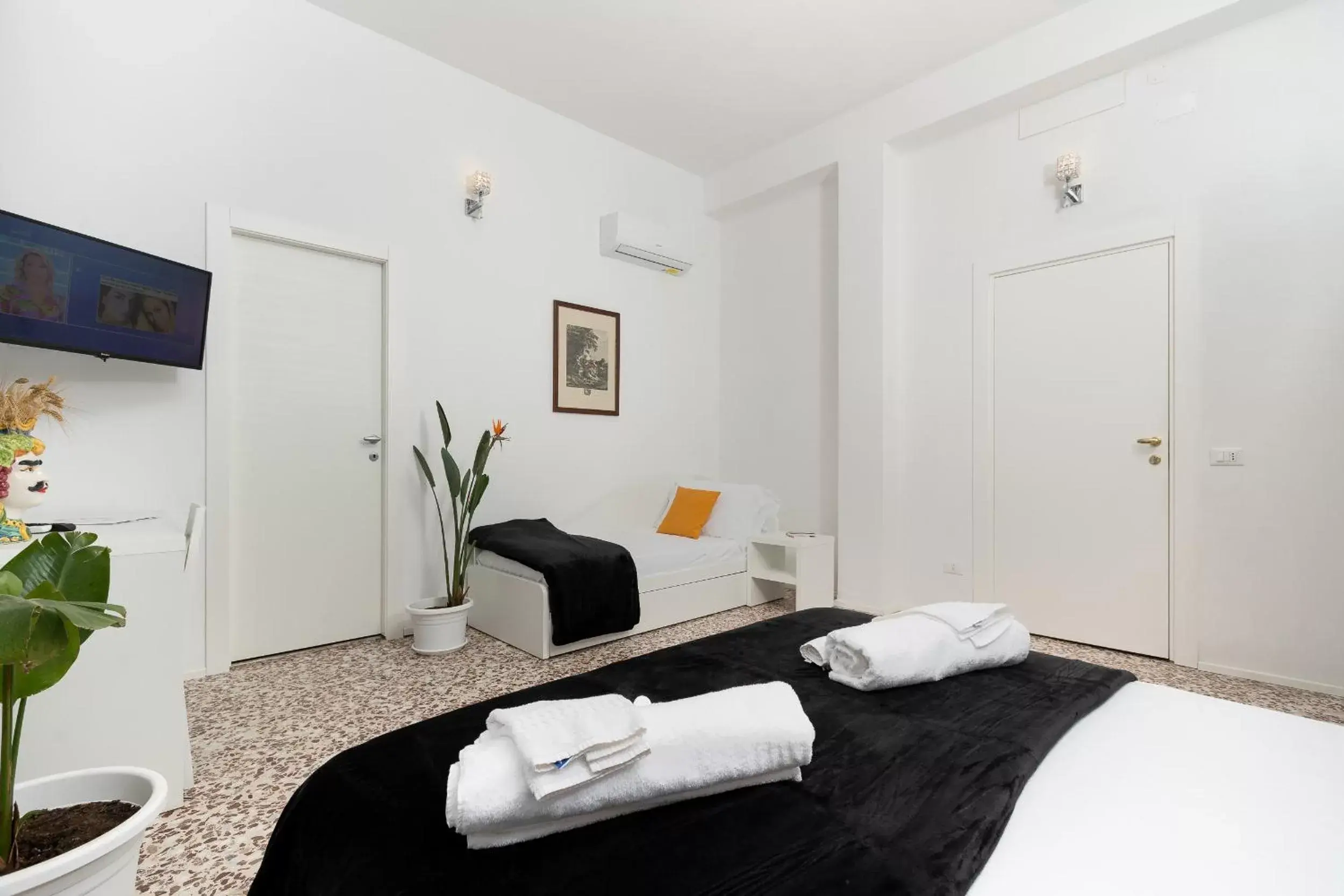 Bedroom in Regina Margherita - Bed and Breakfast & Rooftop Lounge Bar
