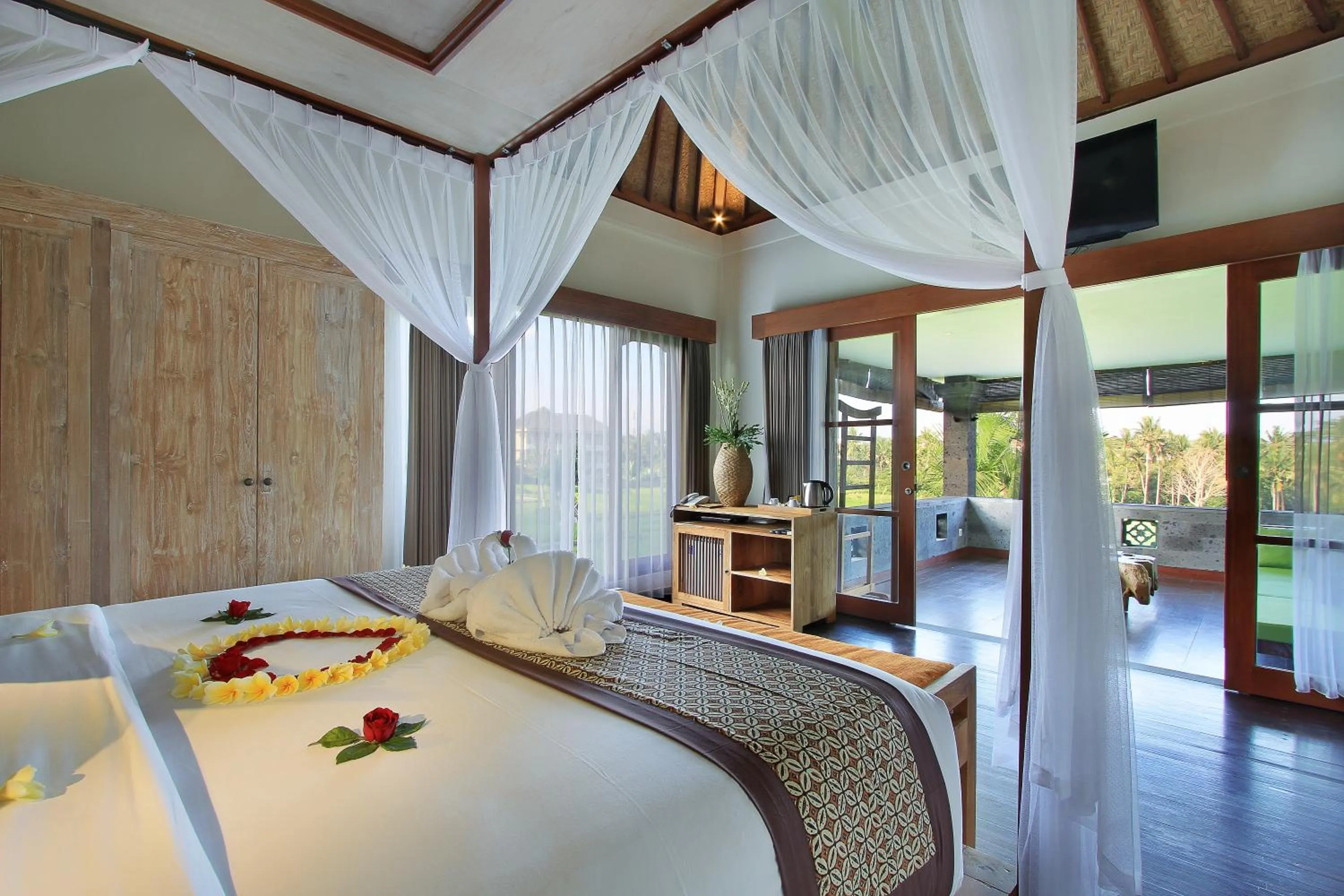 Bed in D'Legon Villas