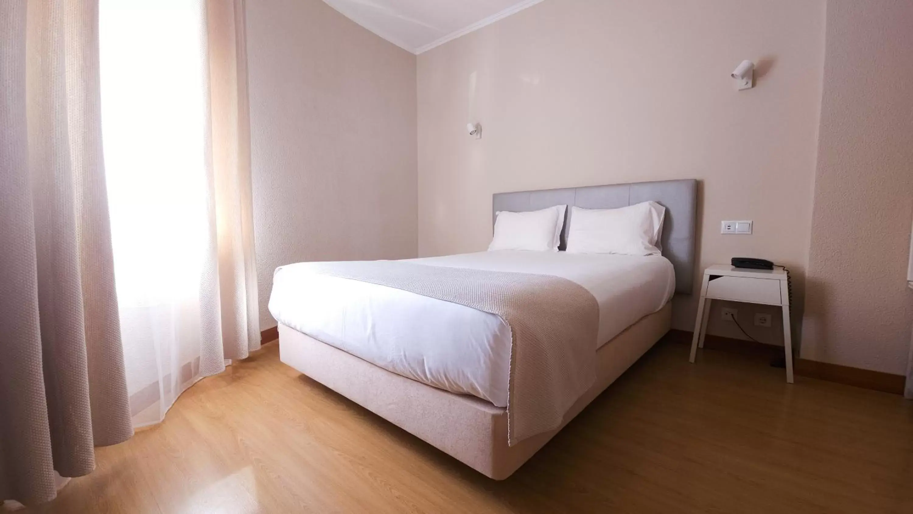 Bed in Hotel Laitau