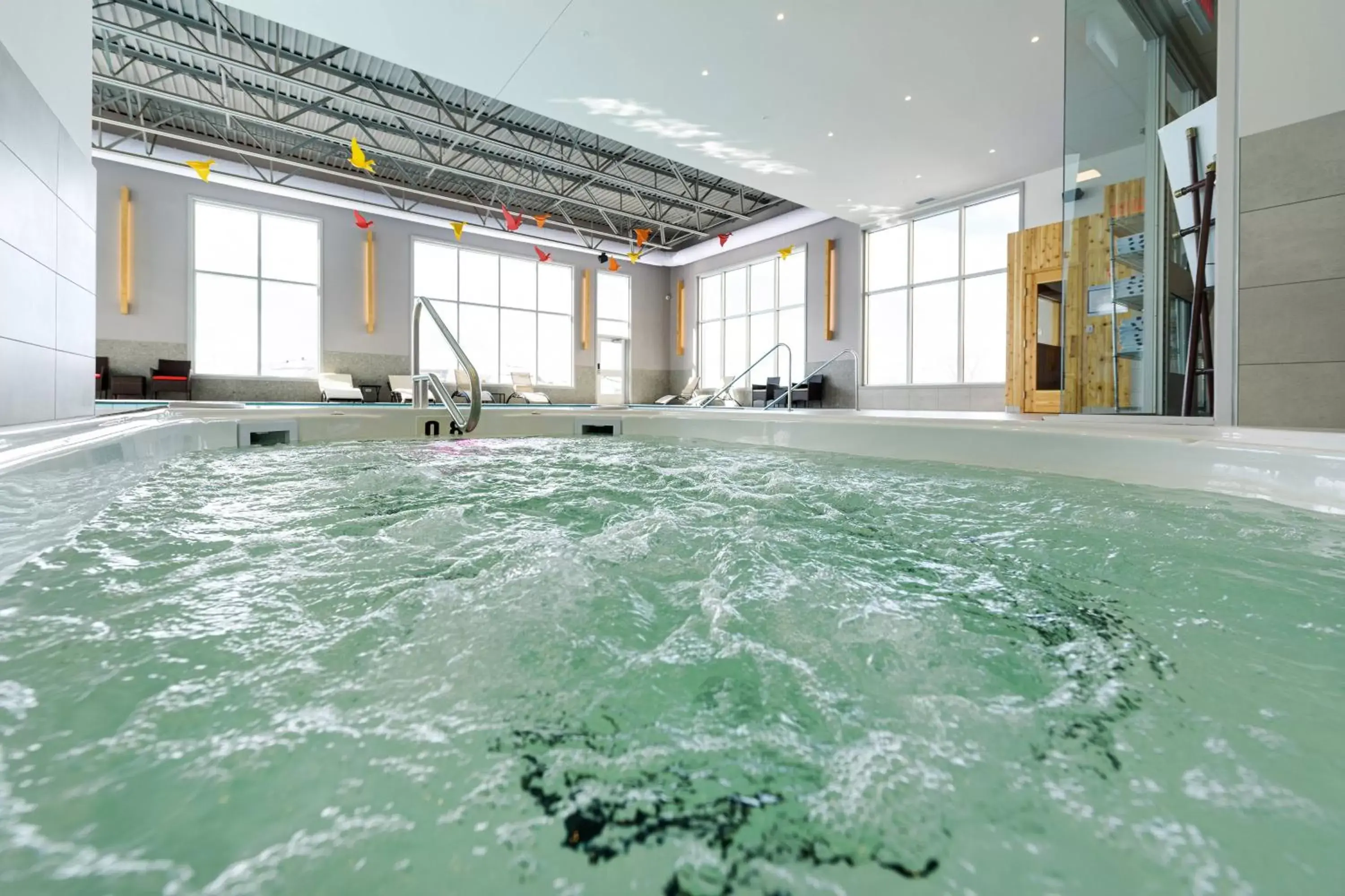 Fitness centre/facilities, Swimming Pool in Delta Hotels by Marriott Saguenay Conference Centre