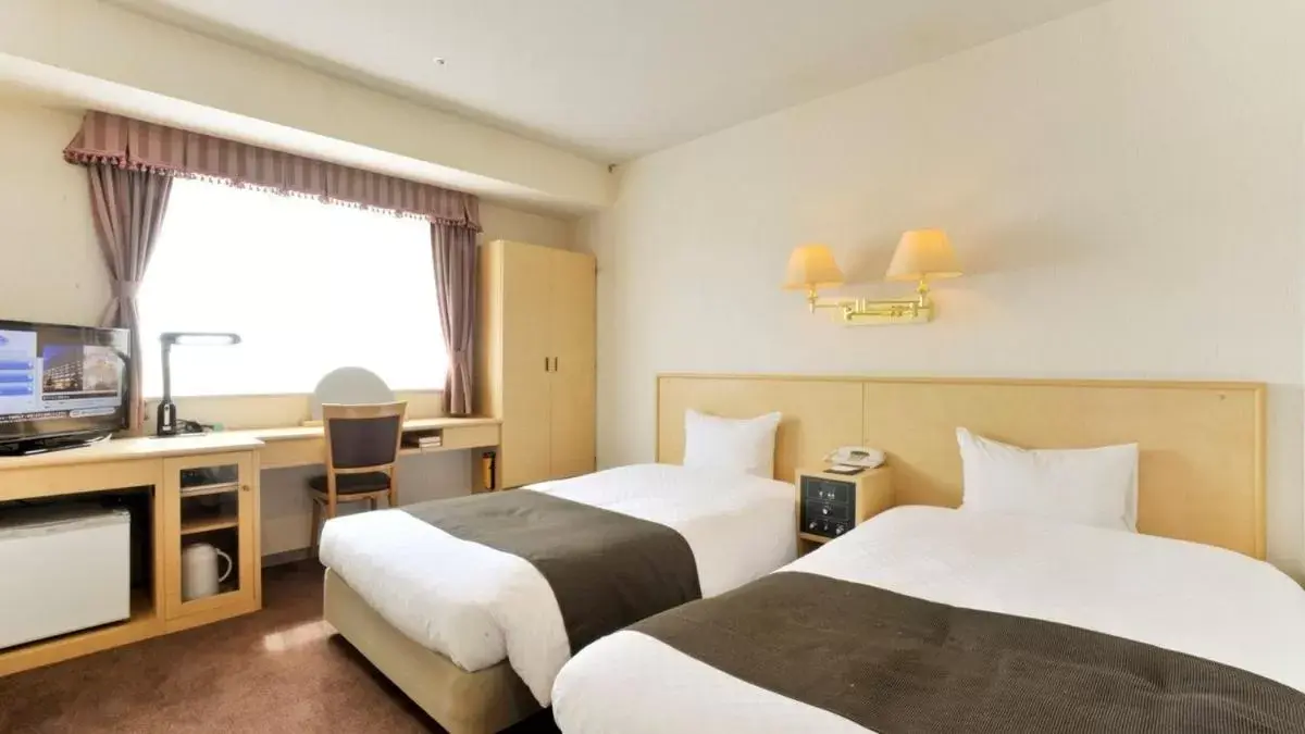 Bed in Yamagata Kokusai Hotel