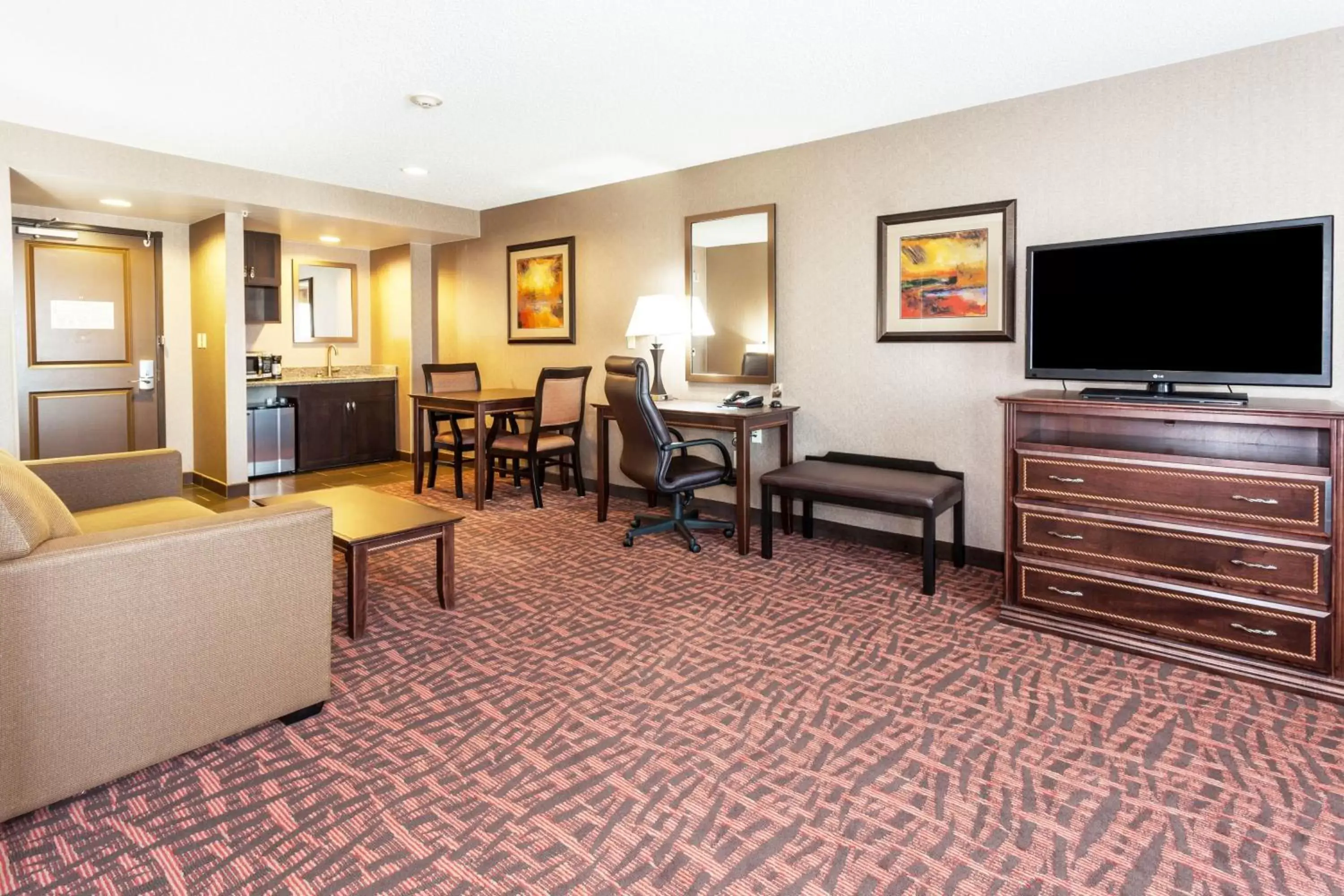 Photo of the whole room, TV/Entertainment Center in Holiday Inn Express Hotel & Suites Cheyenne, an IHG Hotel