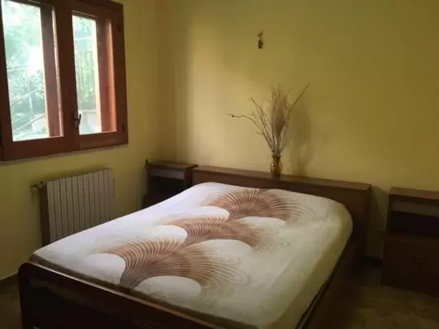 Bed in Stanza in Villa con giardino vista mare