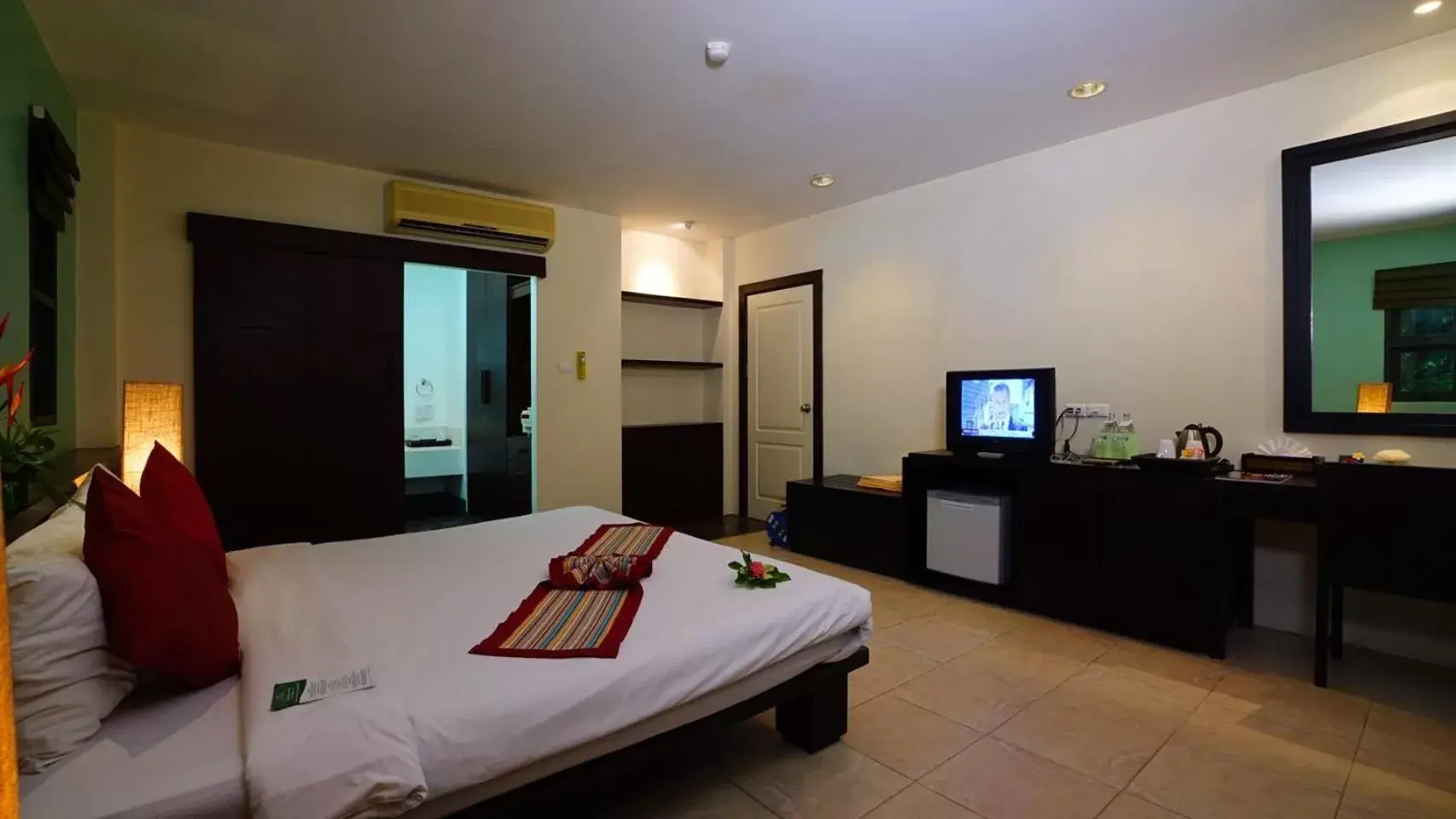 Photo of the whole room, TV/Entertainment Center in Baan Khaolak Beach Resort - SHA Plus