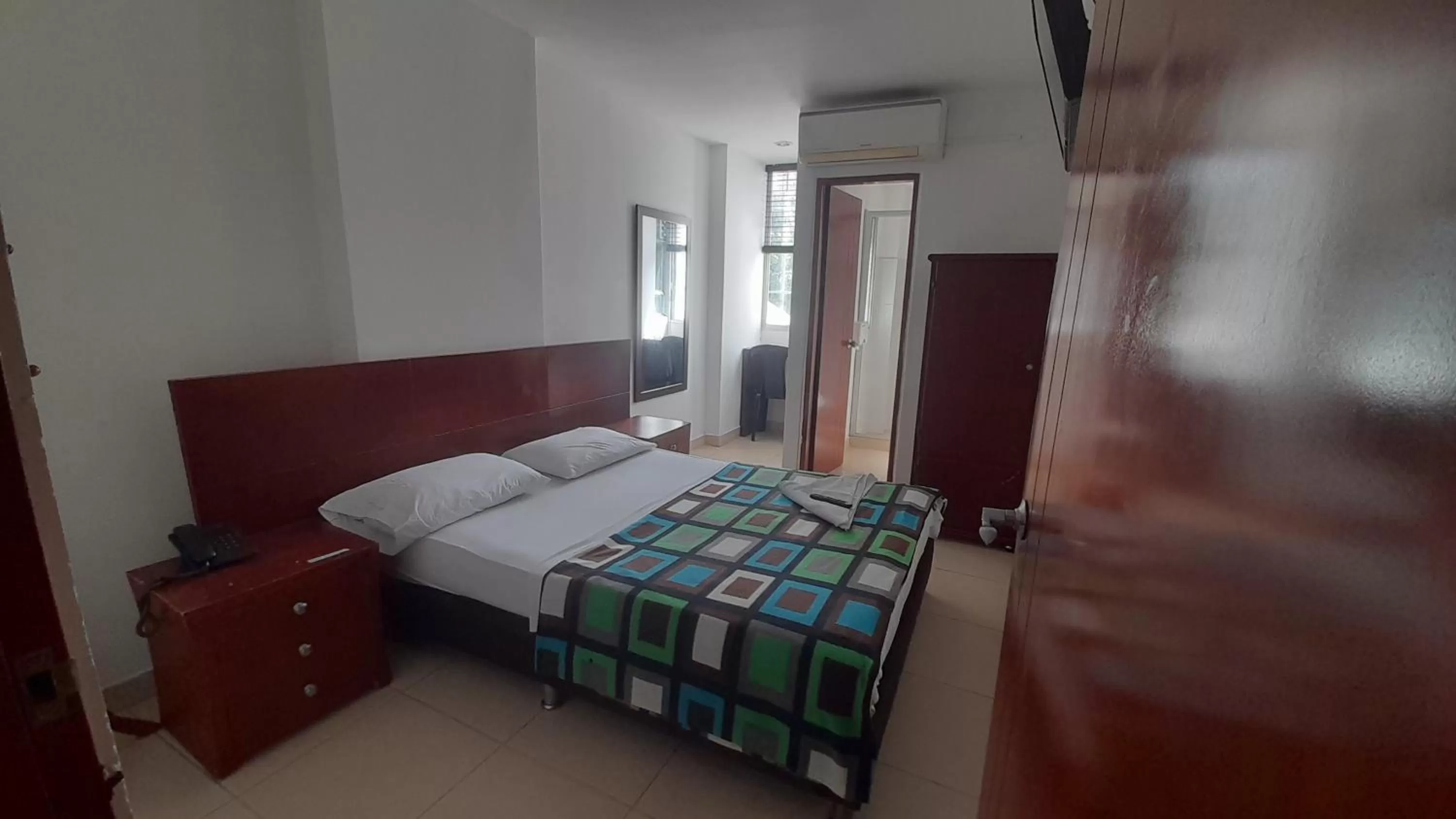 Bed in Hotel Santorini Neiva