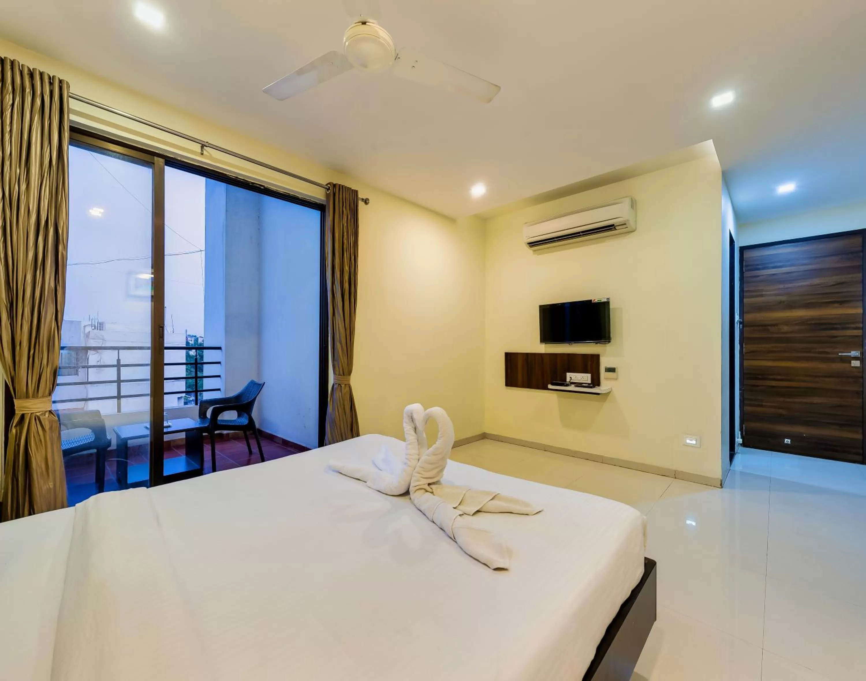 Photo of the whole room, Bed in Hotel Galaxy Inn Kolhapur