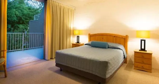 Bed in Andari Holiday Apartments