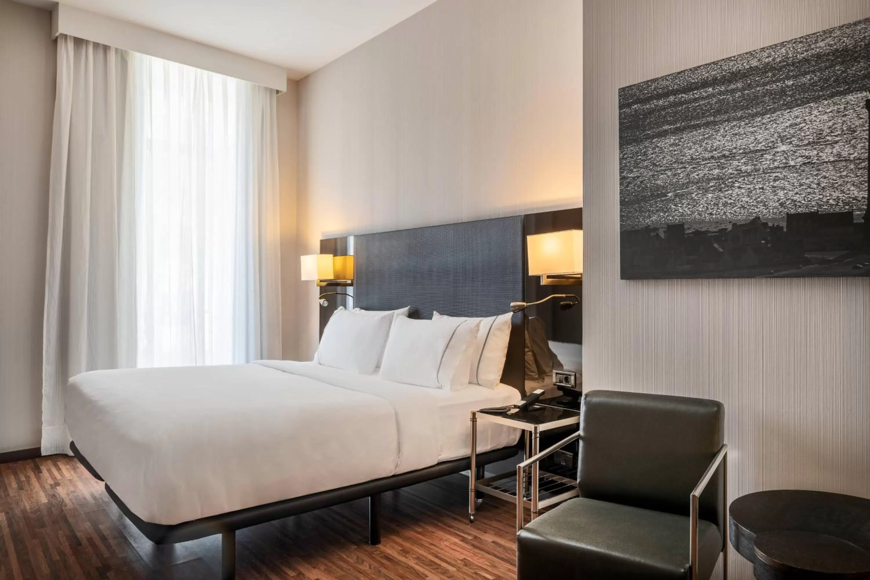 Photo of the whole room, Bed in AC Hotel Palacio Universal by Marriott