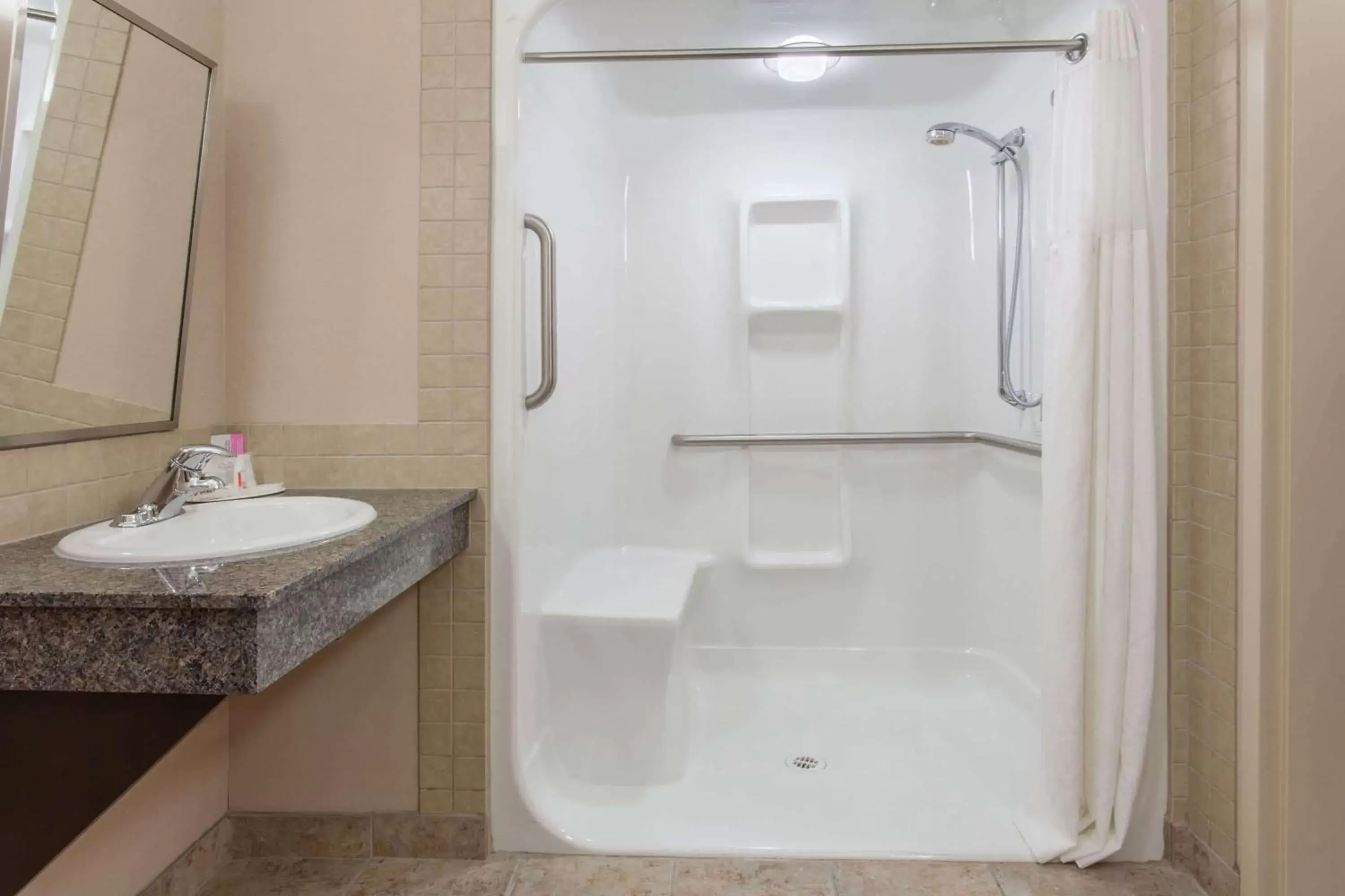 Shower, Bathroom in Ramada by Wyndham Brooks