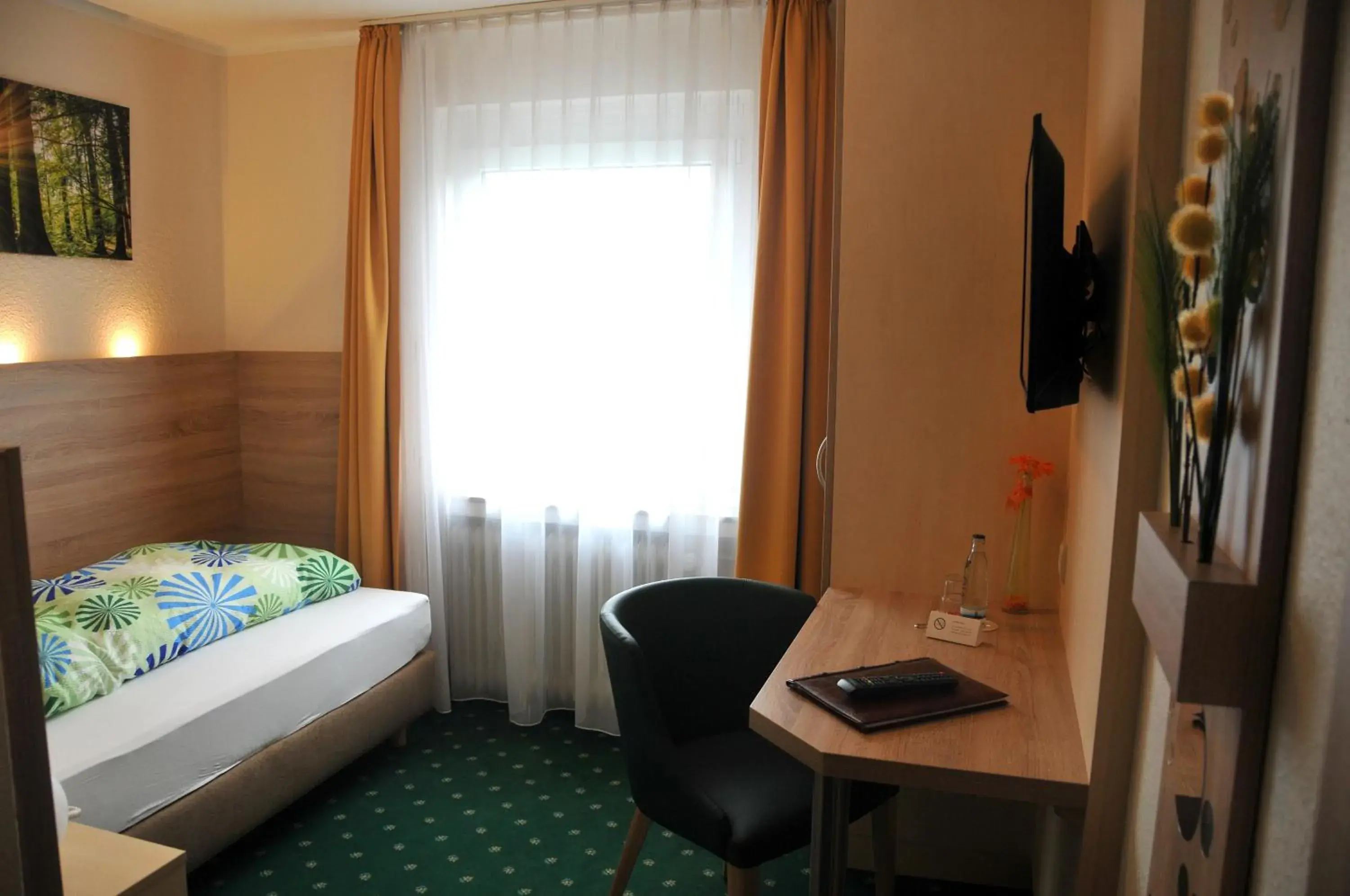 Bed, Seating Area in Hotel Niedersfeld-Winterberg