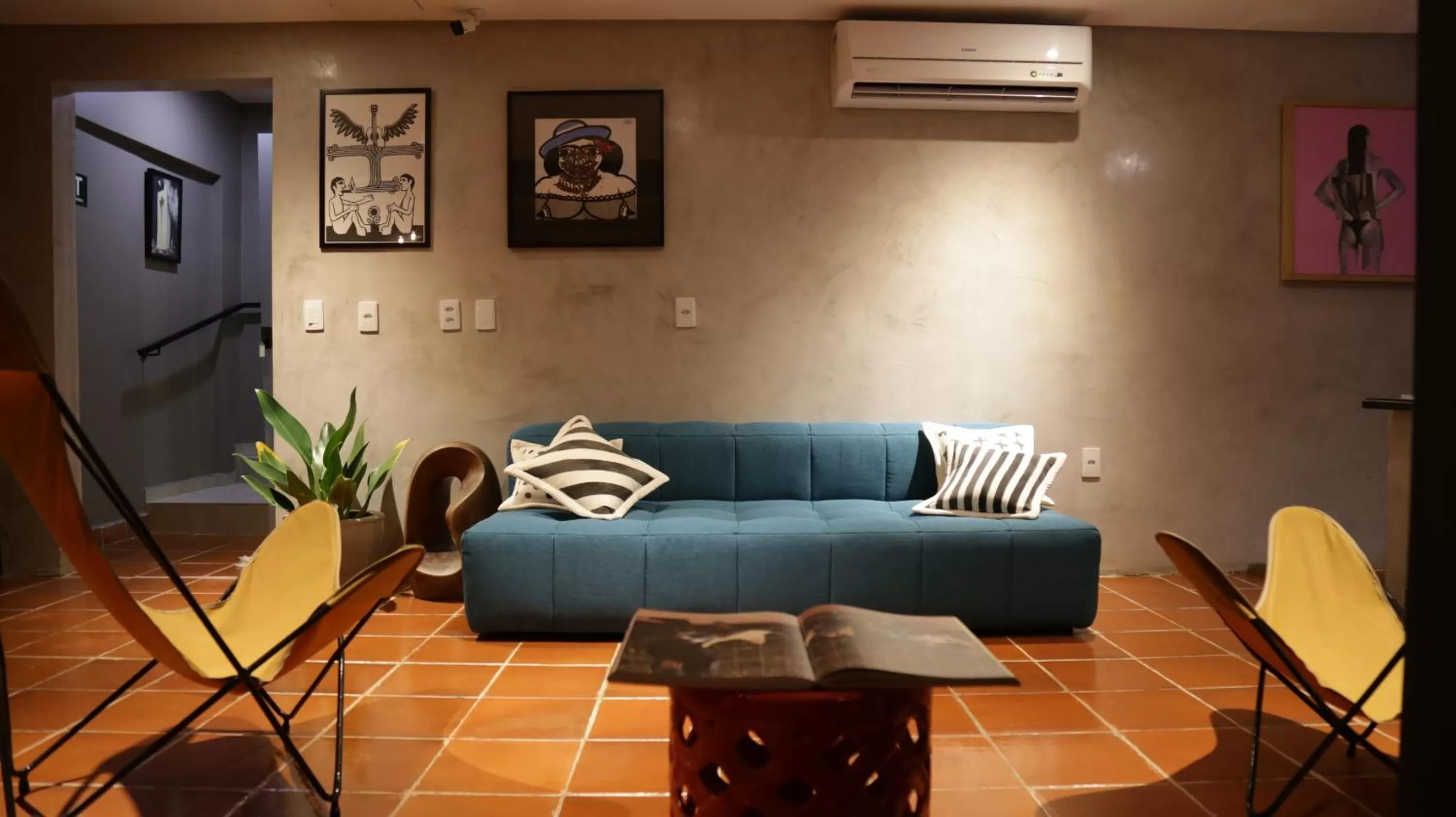 Communal lounge/ TV room in Xilo Design Hotel