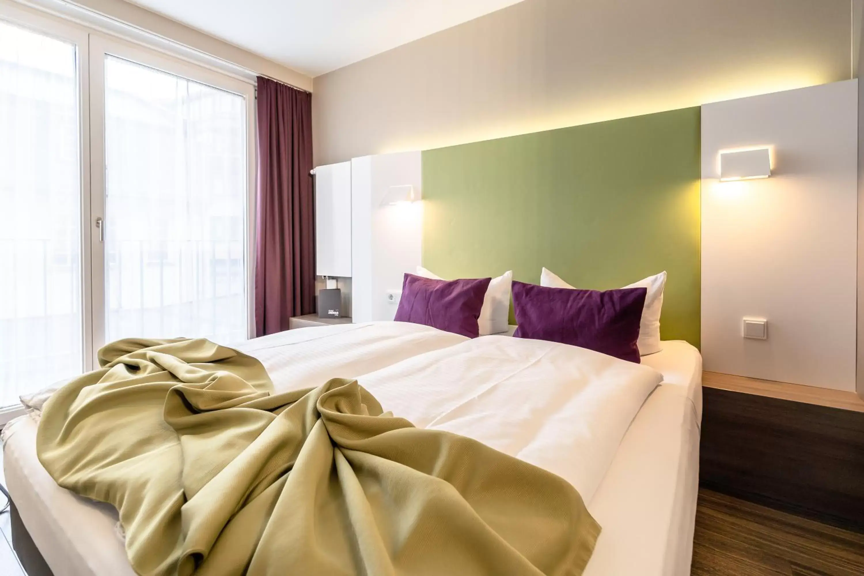 Bed in Hotel Demas City Bed in Hotel Demas City