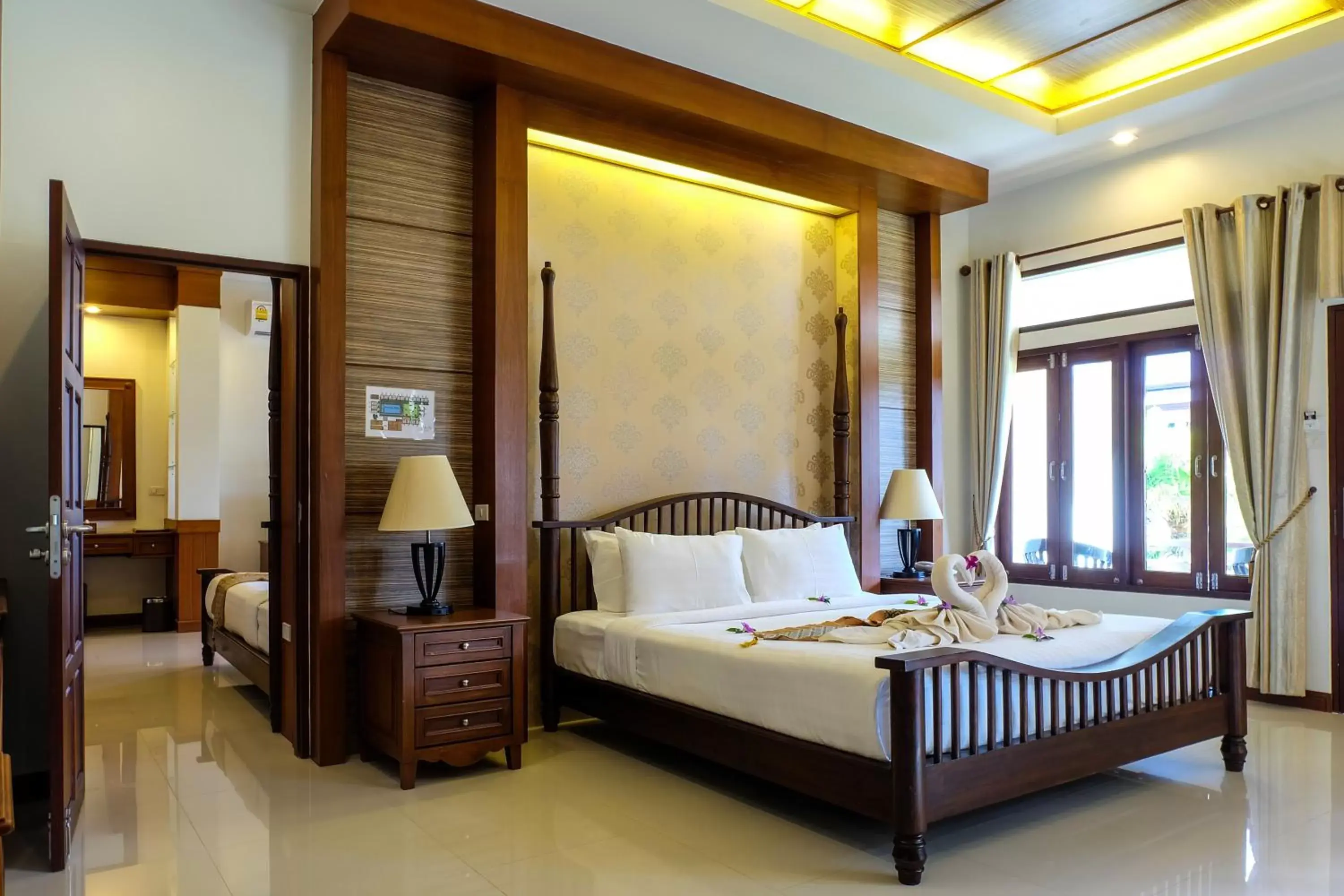 Bed in Bhu Tarn Koh Chang Resort & Spa