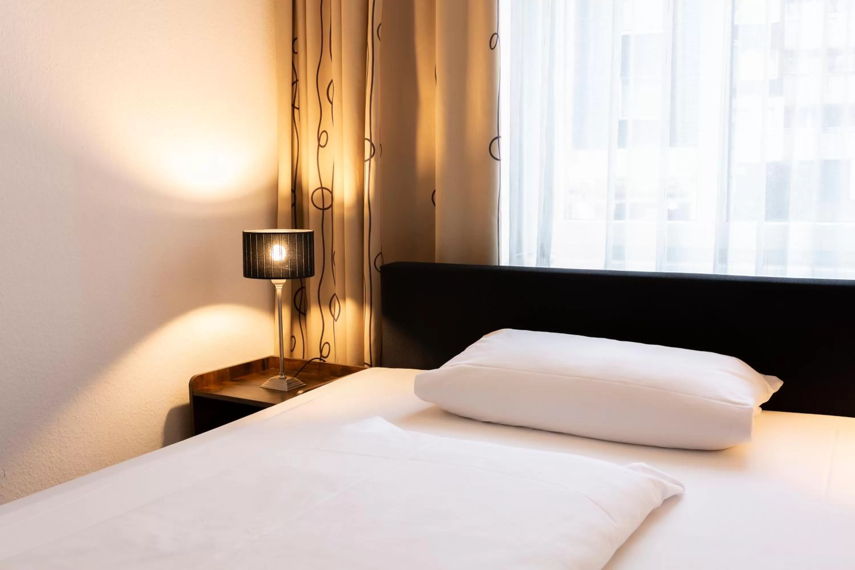 Bed in Hotel Berliner Hof