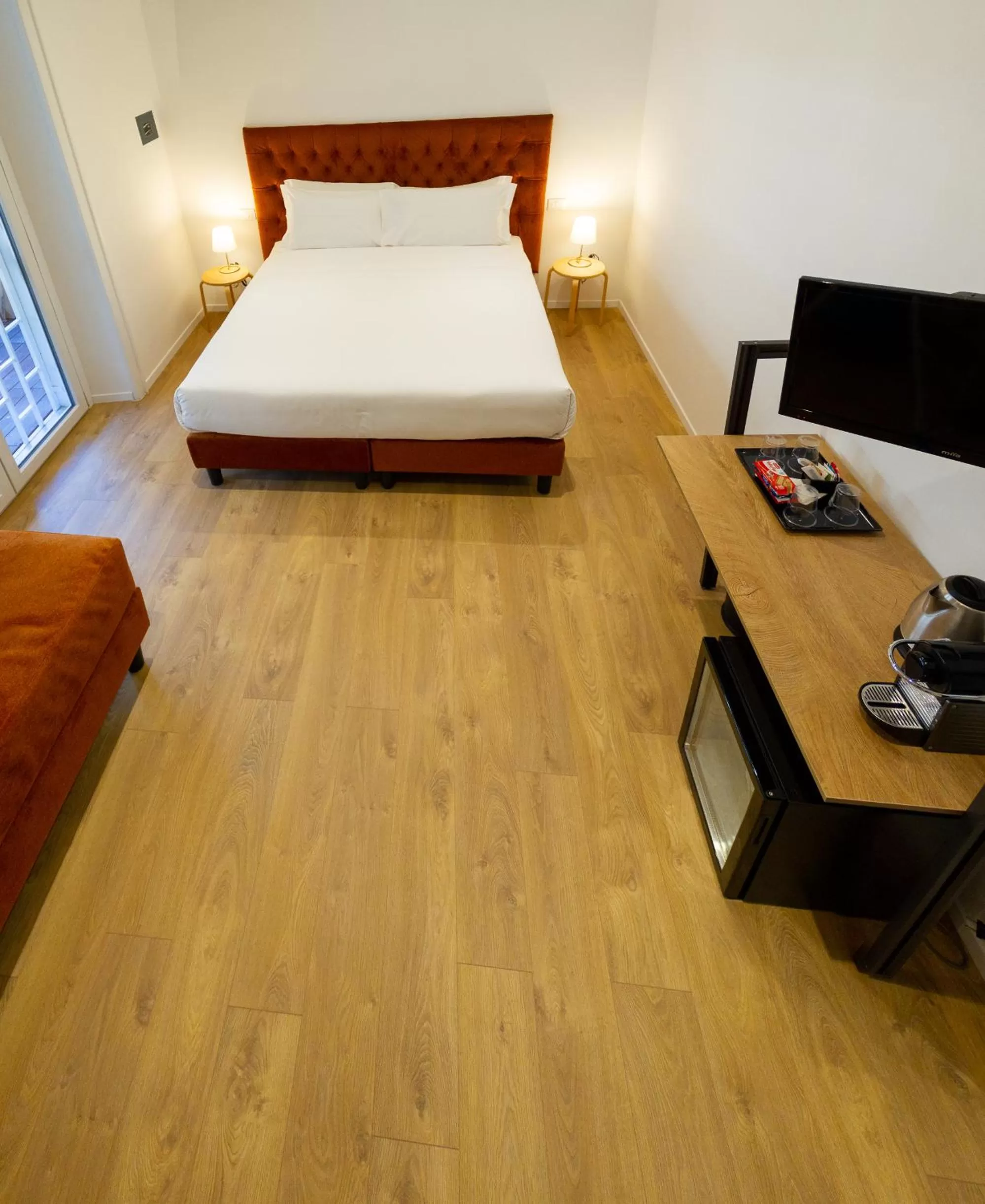 Bed in Michelangelo Vatican Rooms