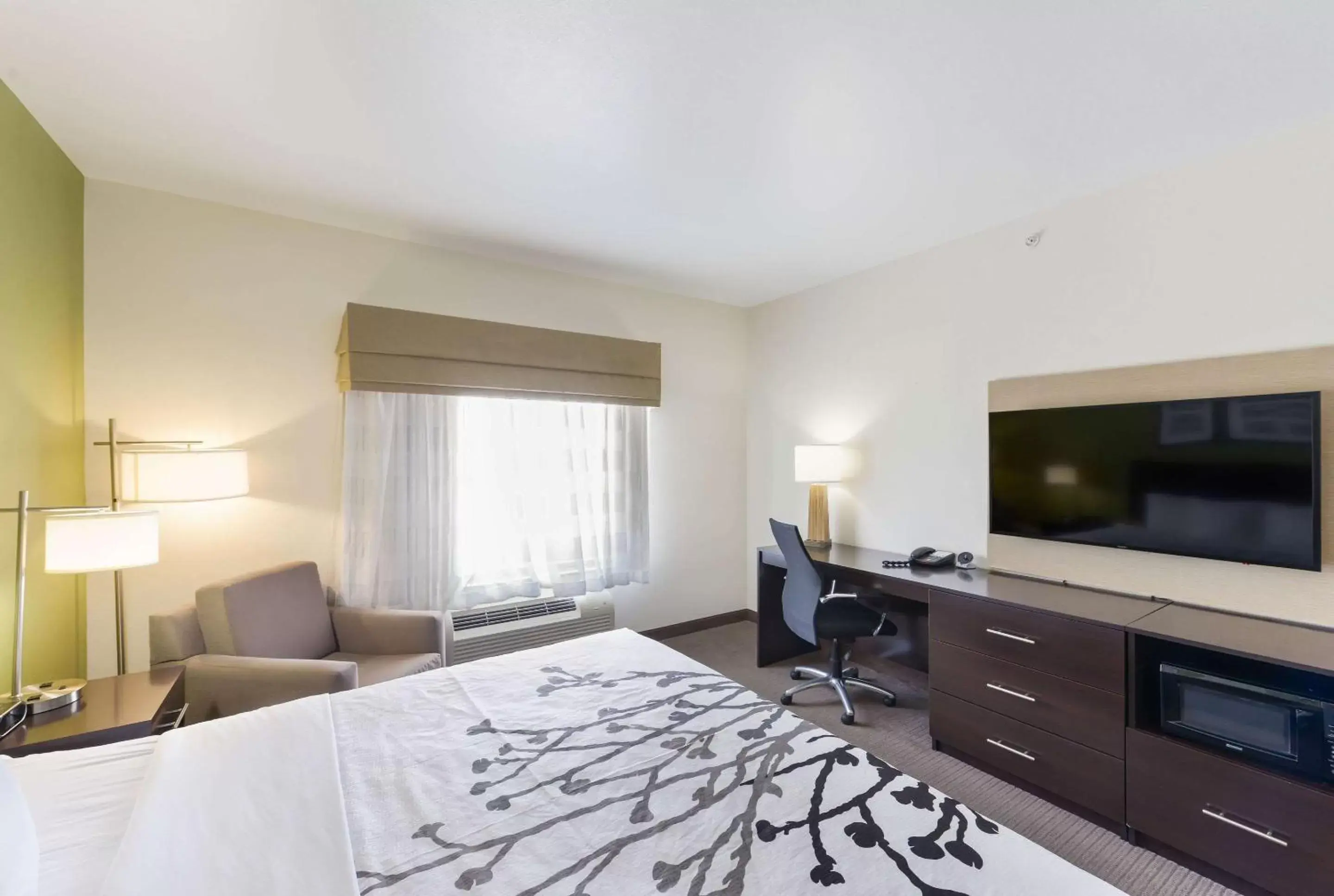 Photo of the whole room, TV/Entertainment Center in Sleep Inn & Suites Midland West