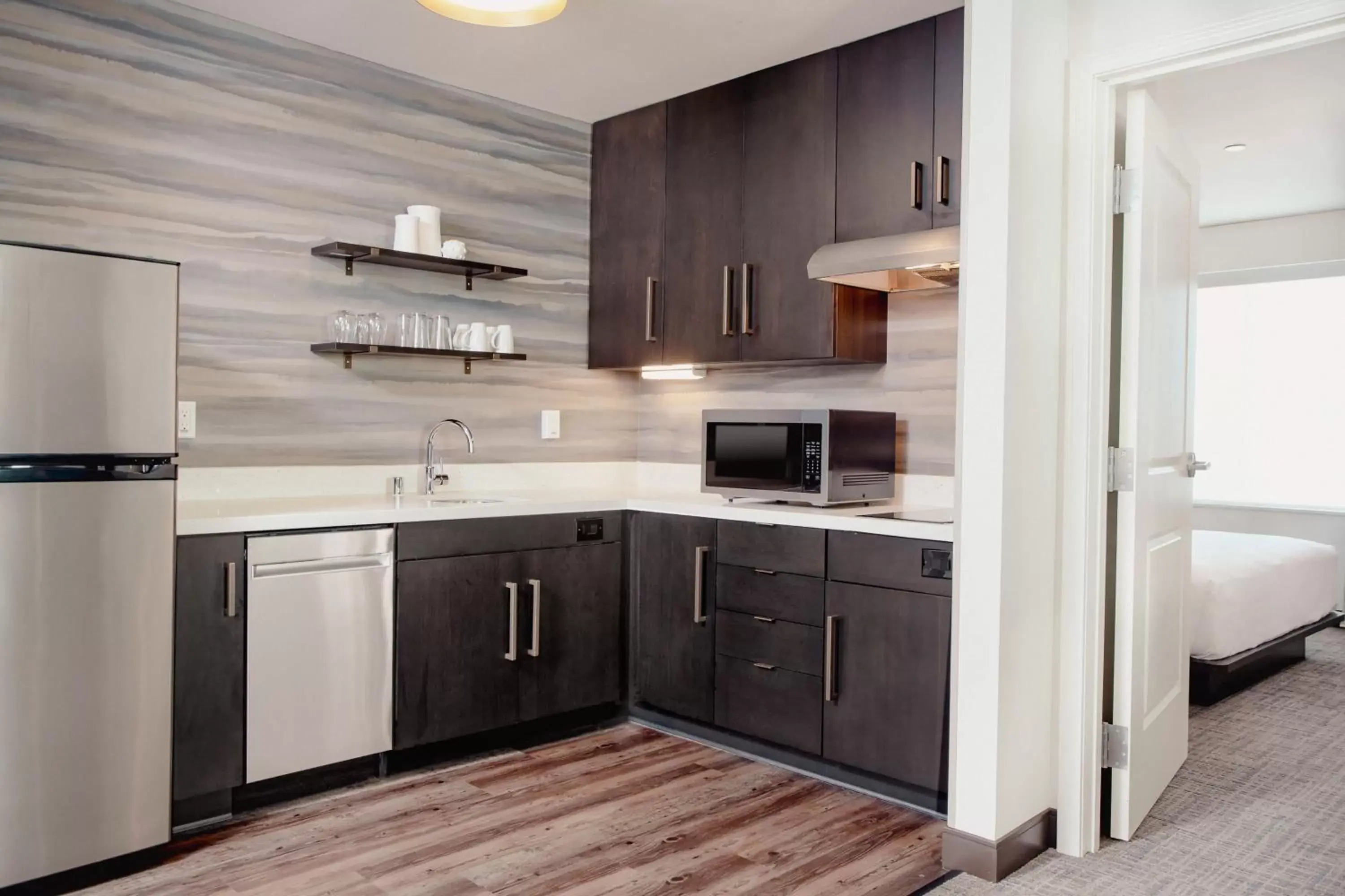 Bedroom, Kitchen/Kitchenette in Residence Inn by Marriott Loma Linda Redlands