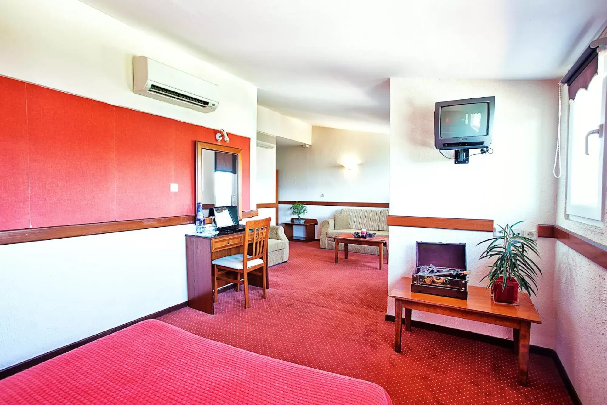 Photo of the whole room, TV/Entertainment Center in Anastassiou Hotel
