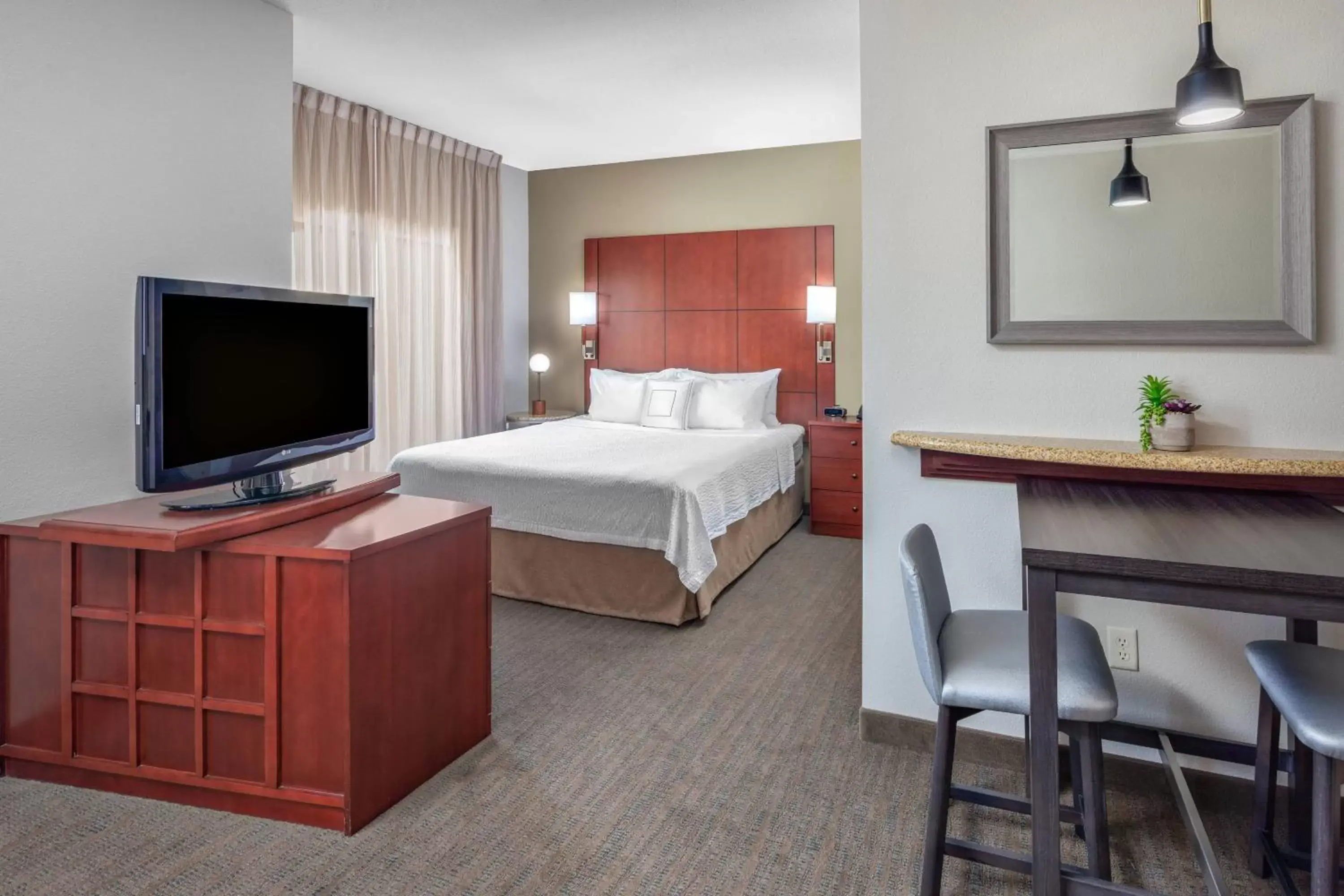 Photo of the whole room, TV/Entertainment Center in Residence Inn Phoenix NW/Surprise