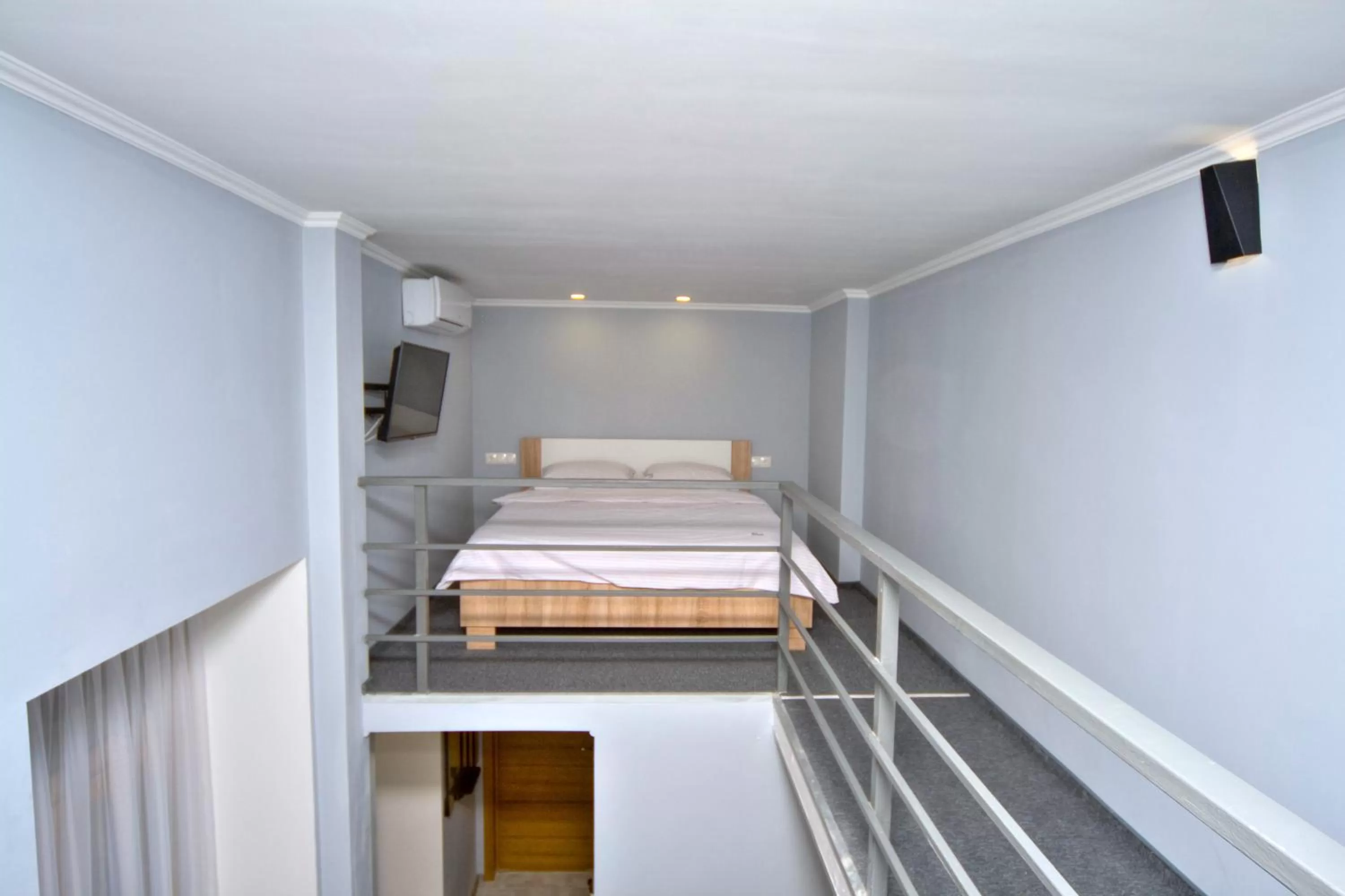 Bed in Grand Apartments