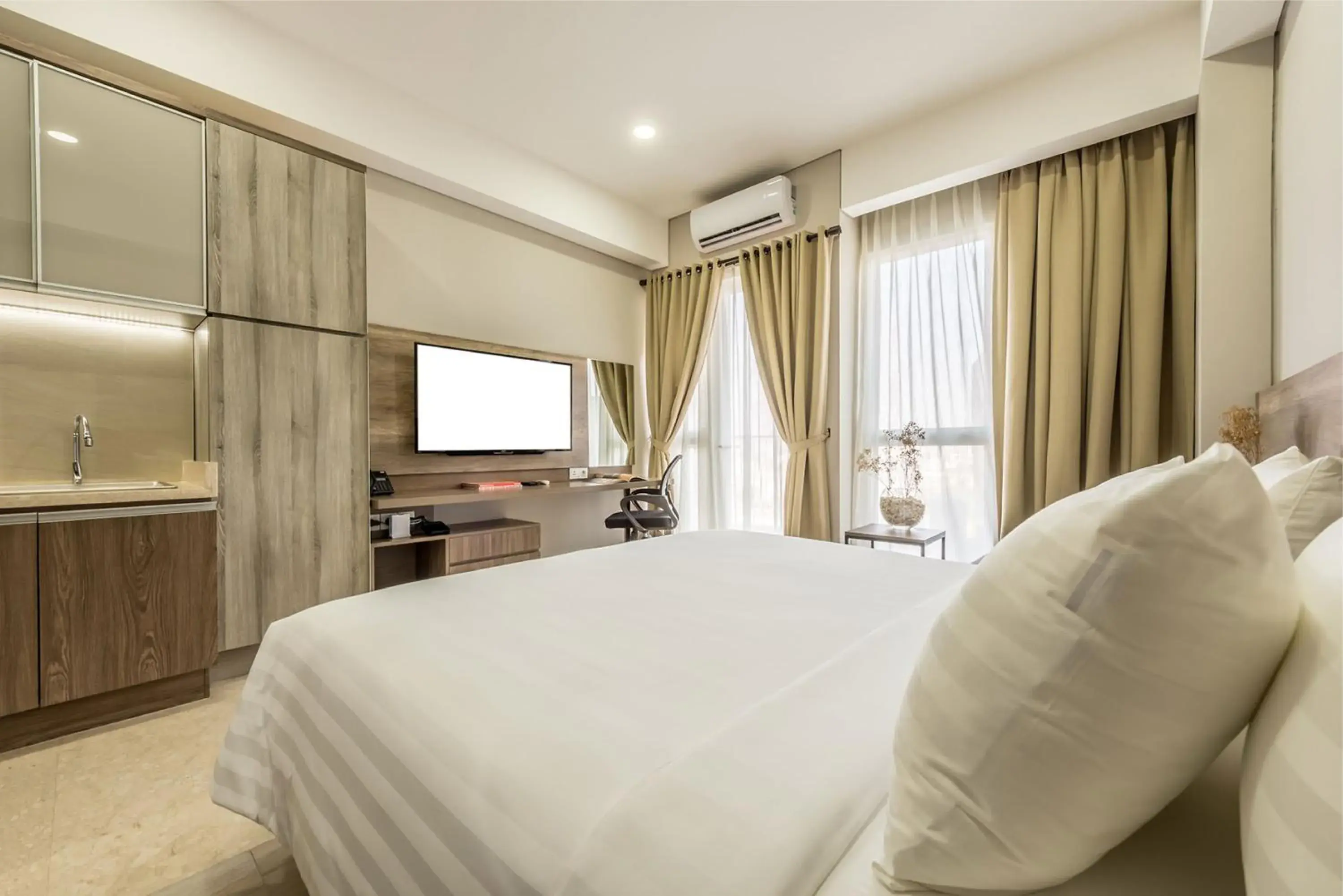 Bedroom, Bed in Grande Valore Hotel & Serviced-Apartment