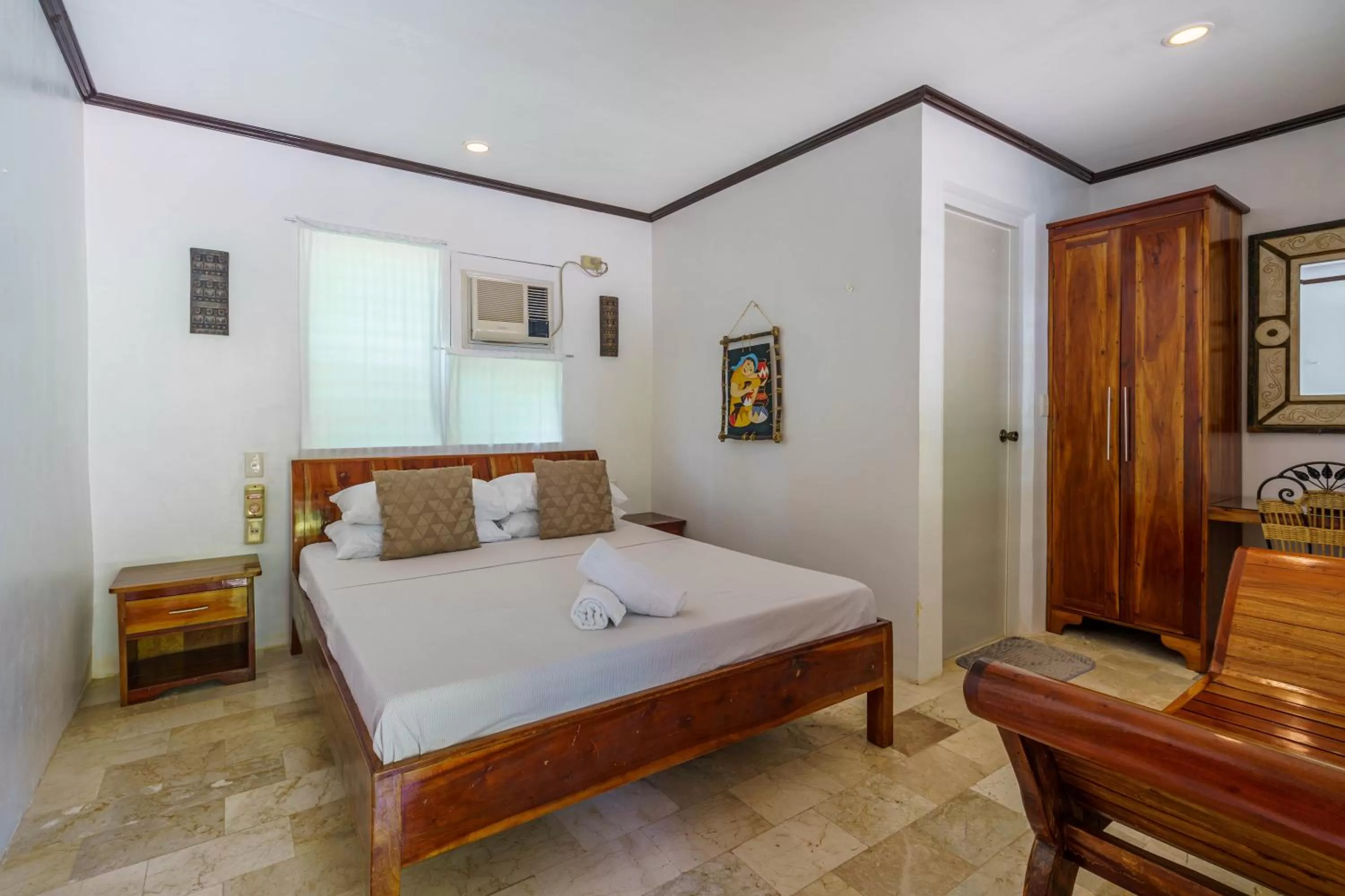 Bed in Charisma Beach Resort