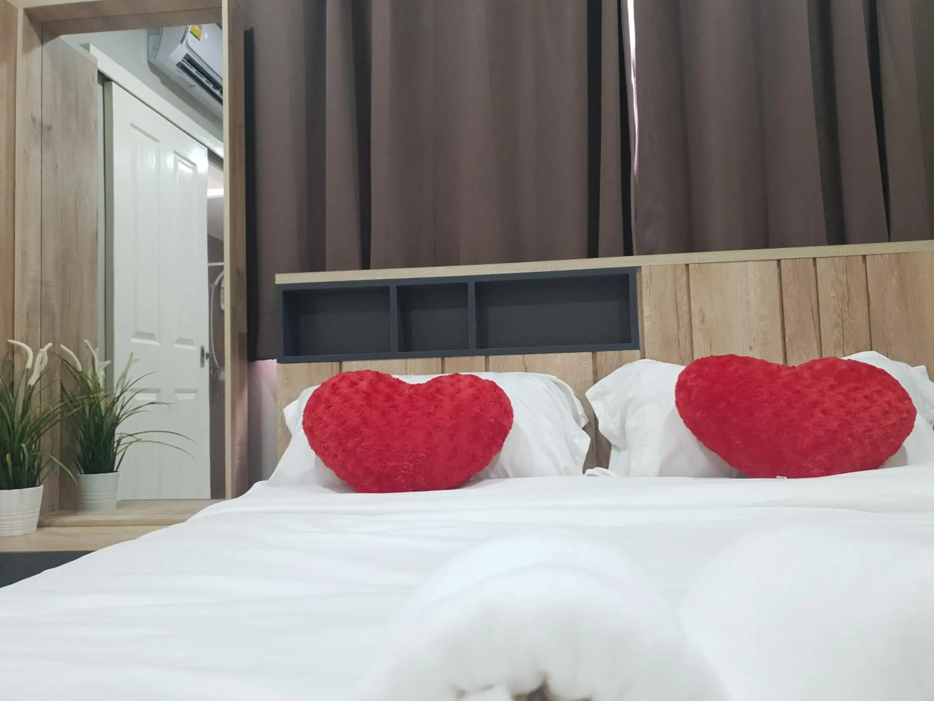 Bed in iResidence Hotel Pathumthani