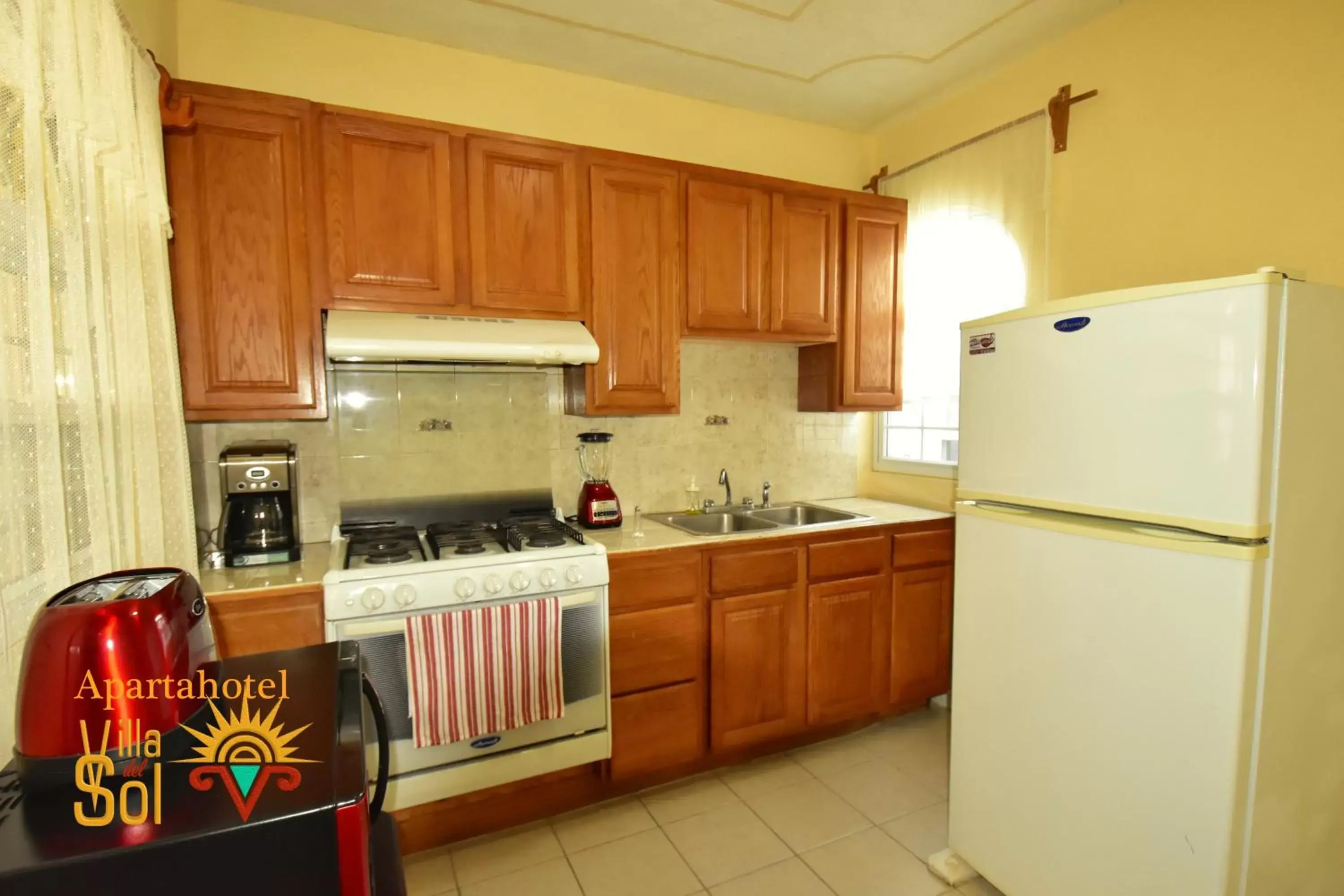 Kitchen/Kitchenette in Villa Del Sol