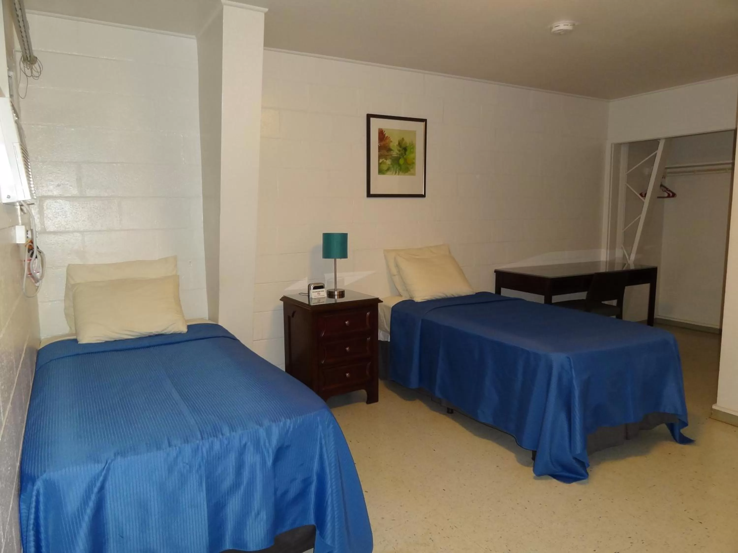 Bed in Tip Top Motel