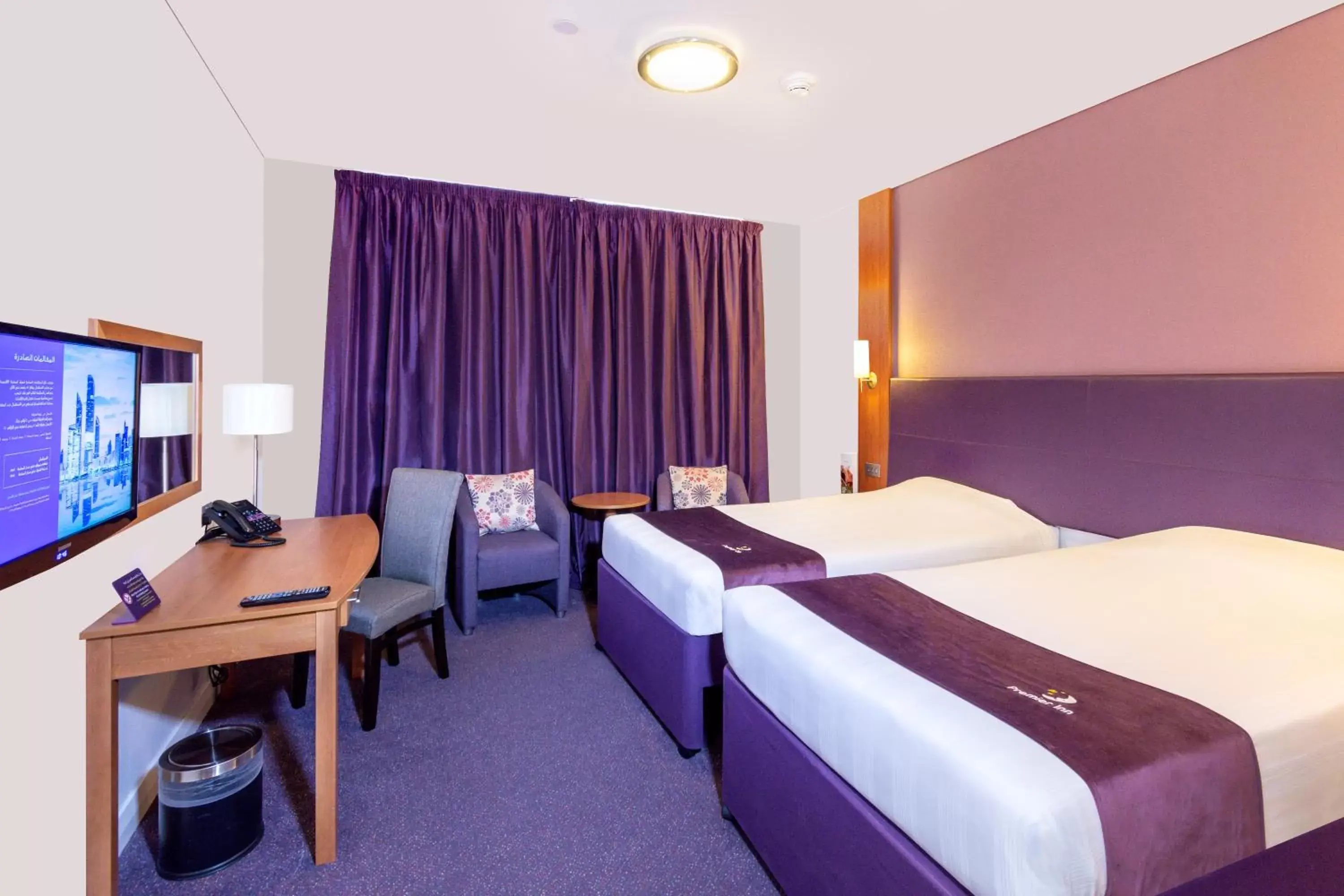 Bed in Premier Inn Abu Dhabi International Airport