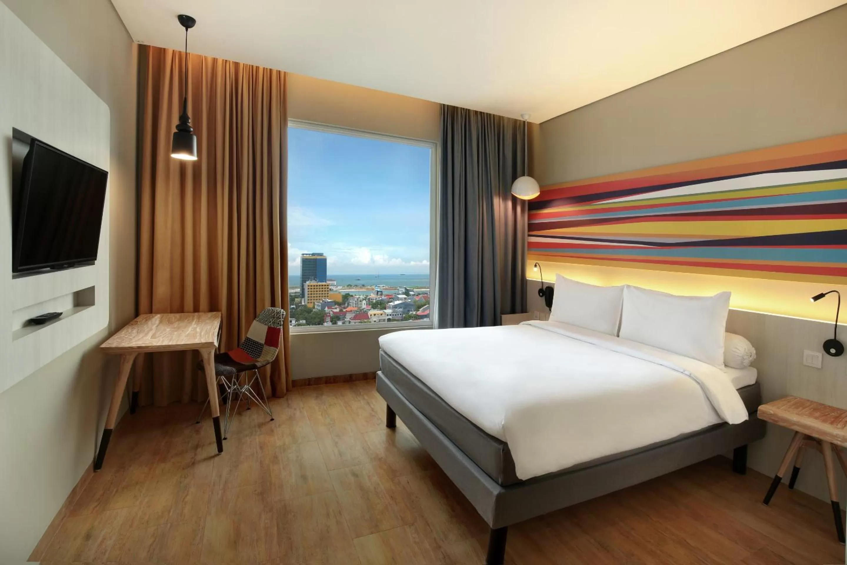 Photo of the whole room, Bed in Ibis Styles Makassar Sam Ratulangi