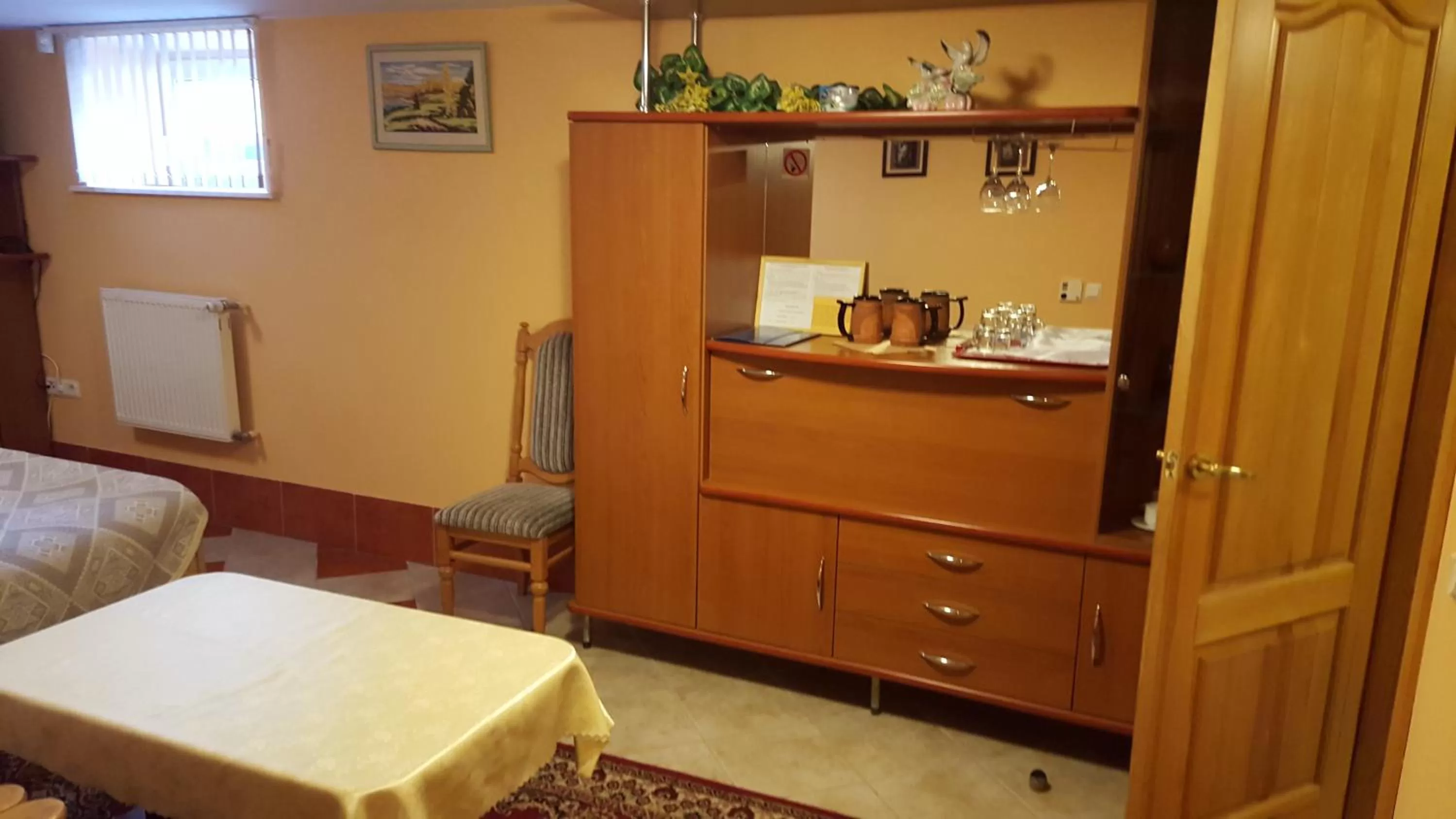 Photo of the whole room, TV/Entertainment Center in Guest House Linas