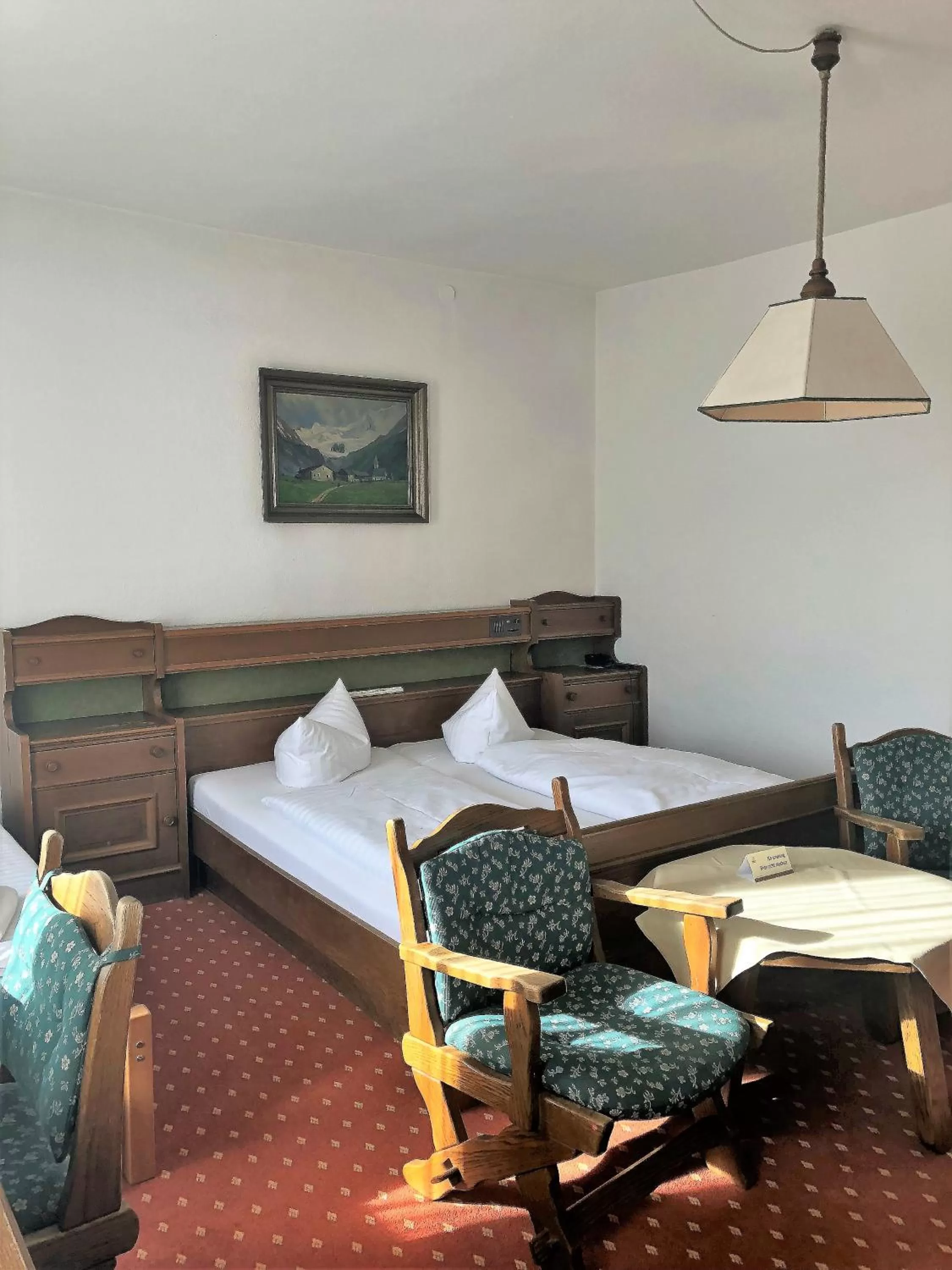 Bed in Hotel Vier Jahreszeiten