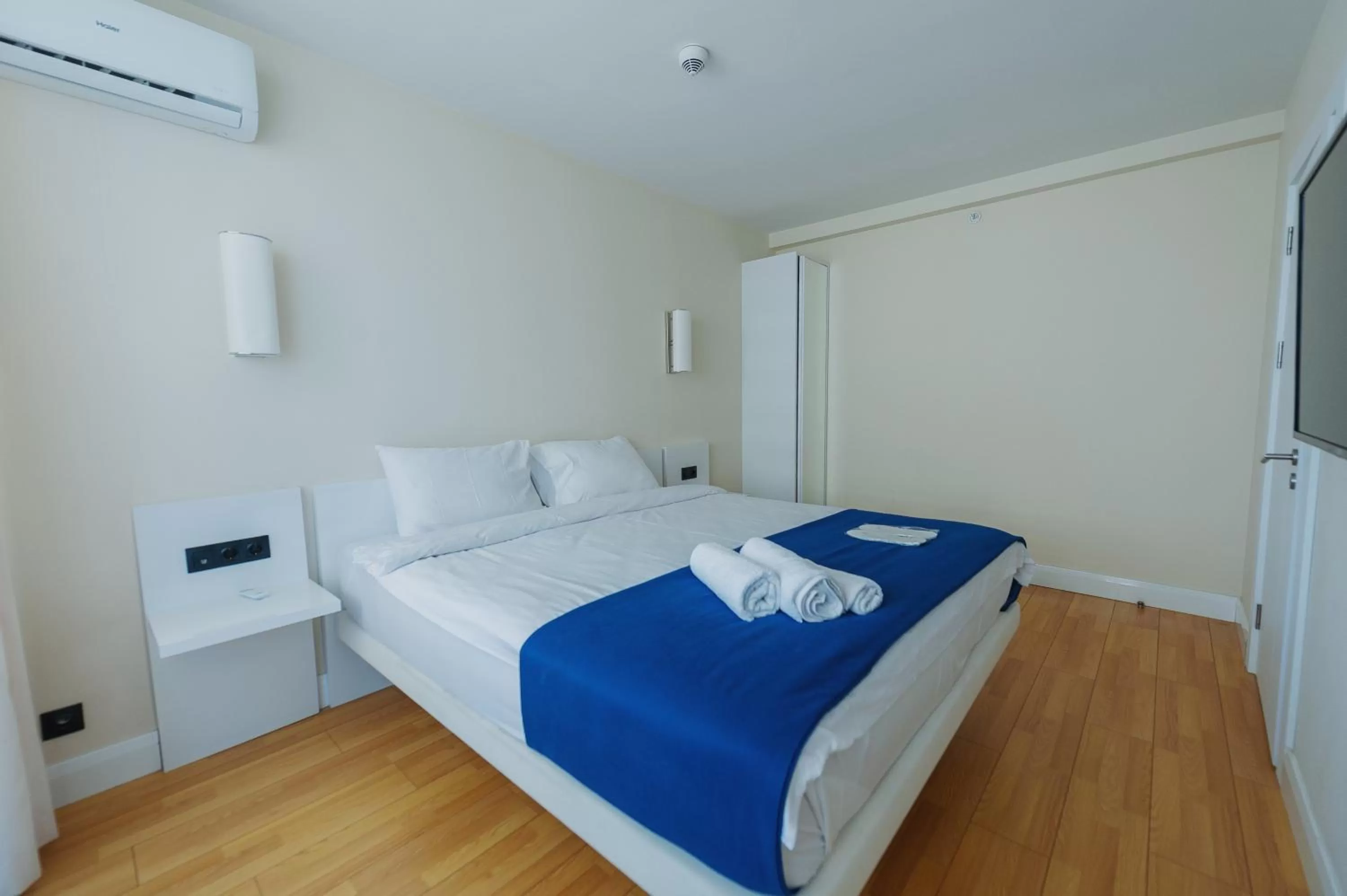 Bed in Orbi City Luxury Suite