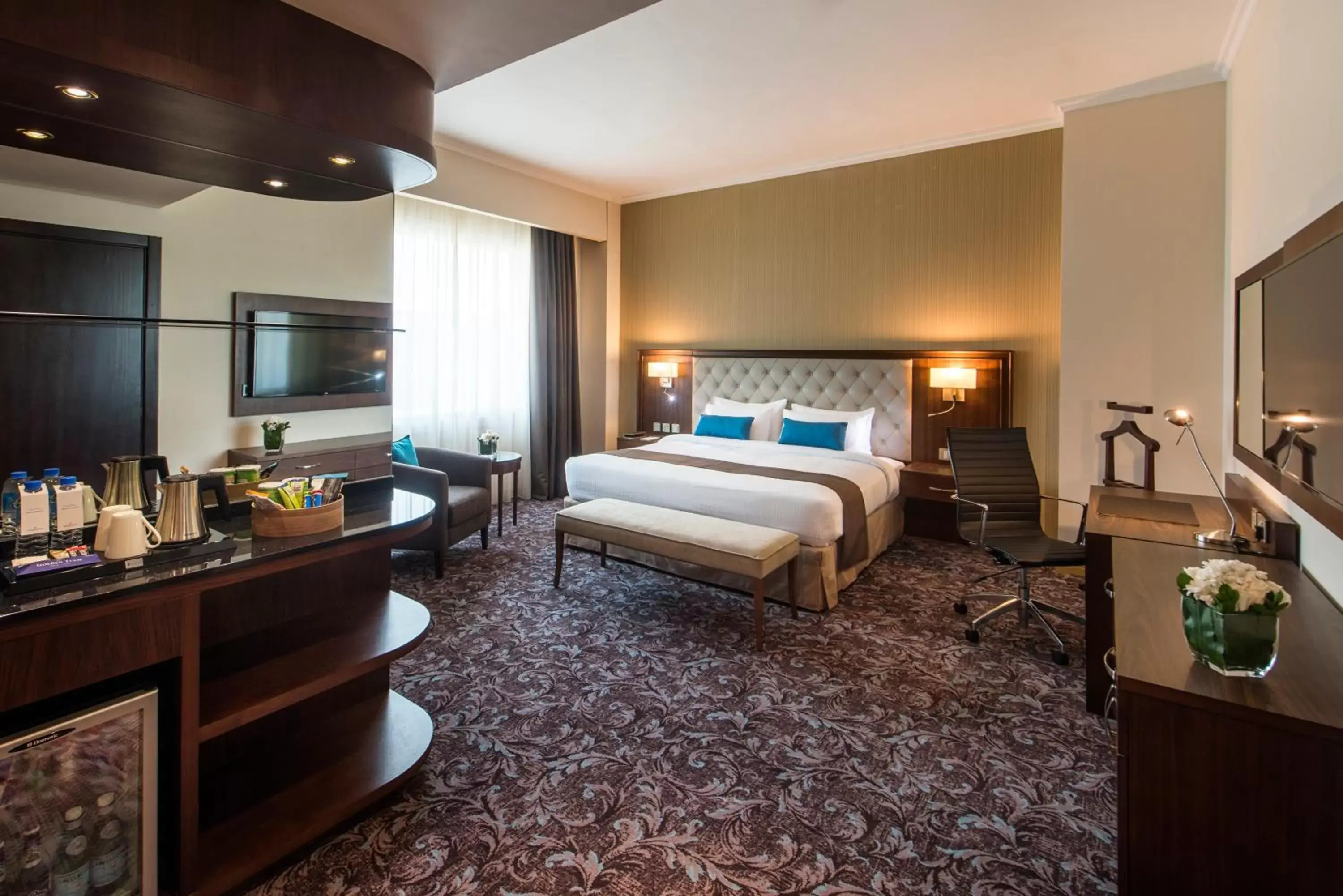 Bed in Golden Tulip Doha Hotel